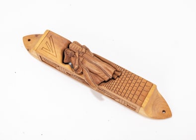 A HAND CARVED WOODEN MEZUZAH. Probably American, 20th century.