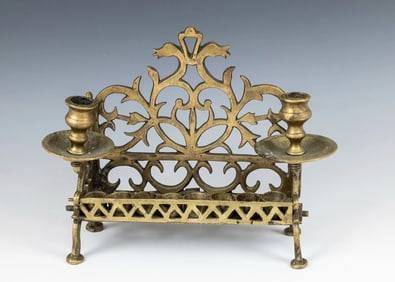 A BRASS HANUKKAH LAMP. Poland, c. 1850. Of traditional form.