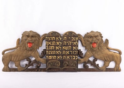 A LARGE PAIR OF HAND CARVED WOODEN LIONS FROM AN ARON KODESH.