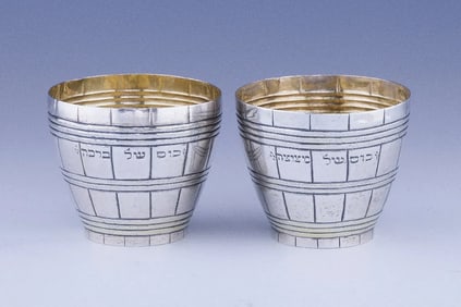 AN EXTREMELY RARE AND LARGE SILVER BARREL FORM BRIS MILAH CUP.