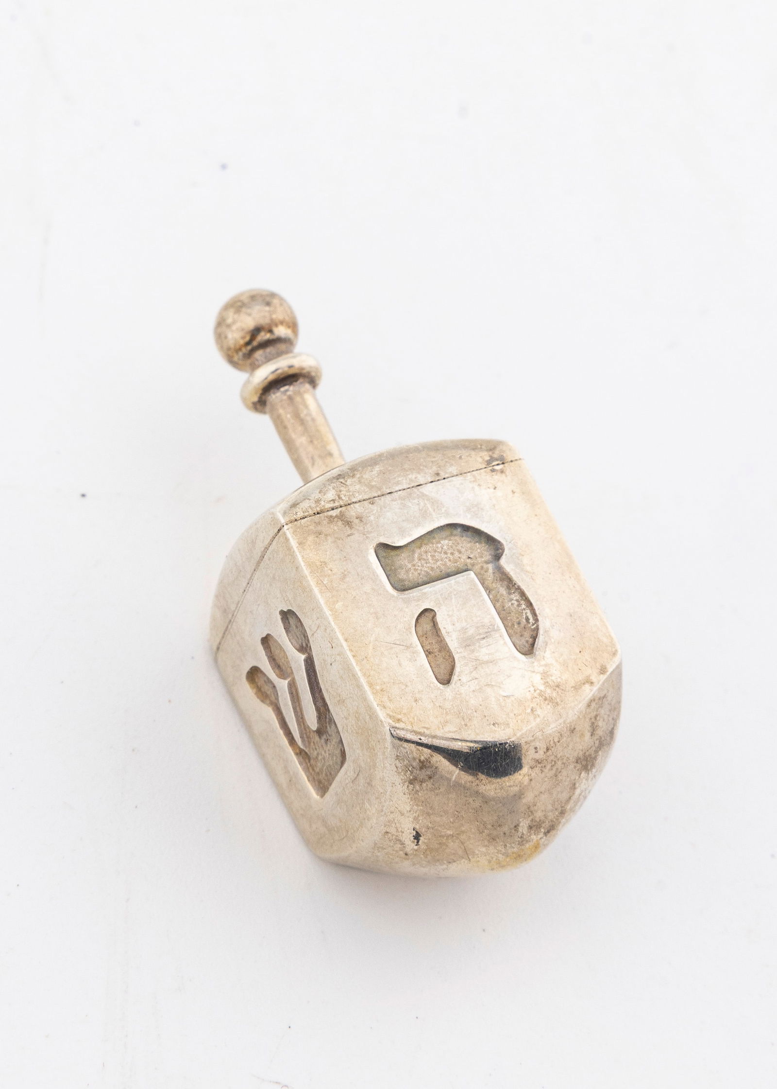 A SOLID STERLING SILVER DREIDEL BY TIFFANY. New York, c.1990. (1 of 2)