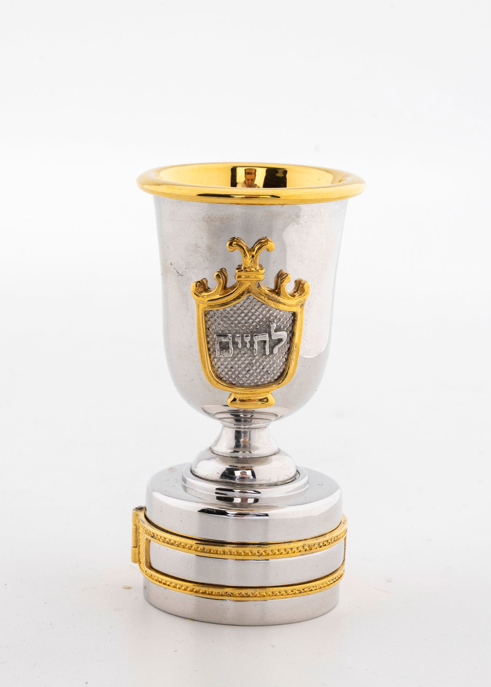 A WHISKEY BOTTLE STOPPER BY SWED MASTER SILVERSMITHS.: Shaped like a wine cup. Signed. Rhodium plated. 2.9" tall.