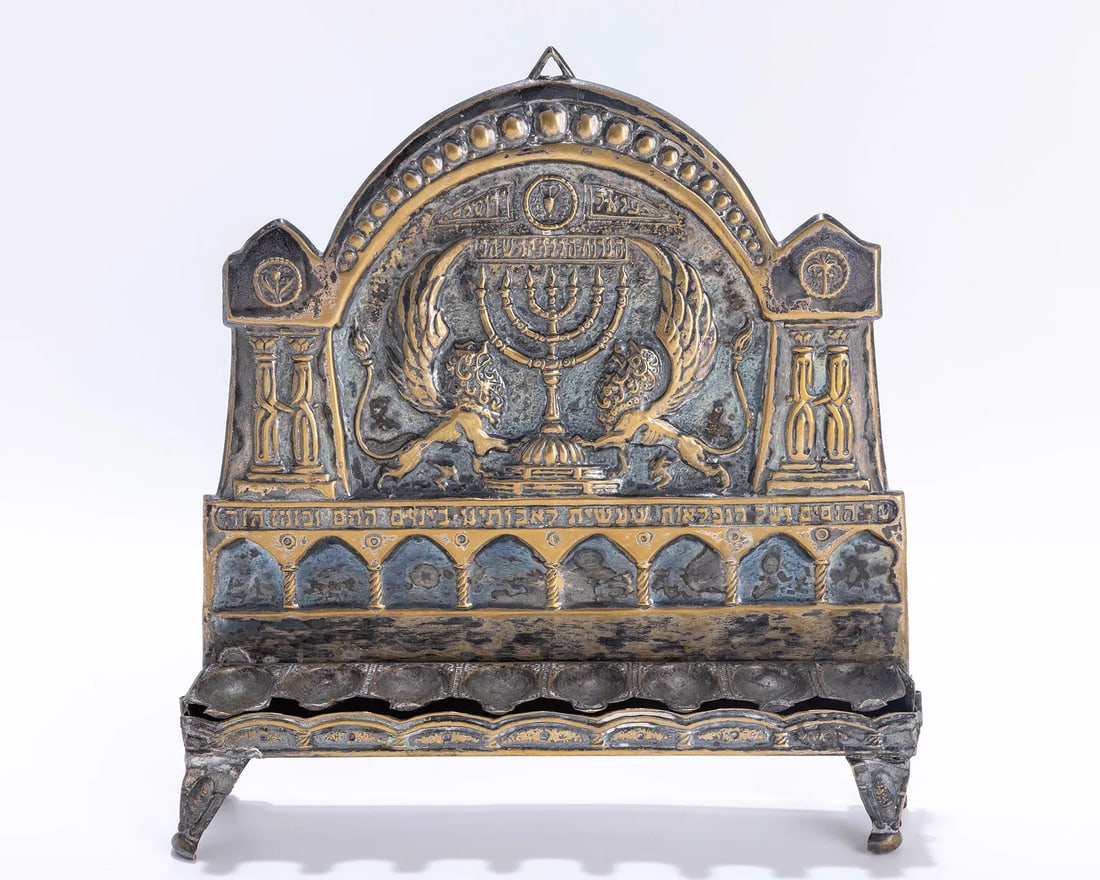 A SILVER PLATED HANUKKAH LAMP BY THE BEZALEL SCHOOL. Jerusalem, c. 1920. (1 of 1)