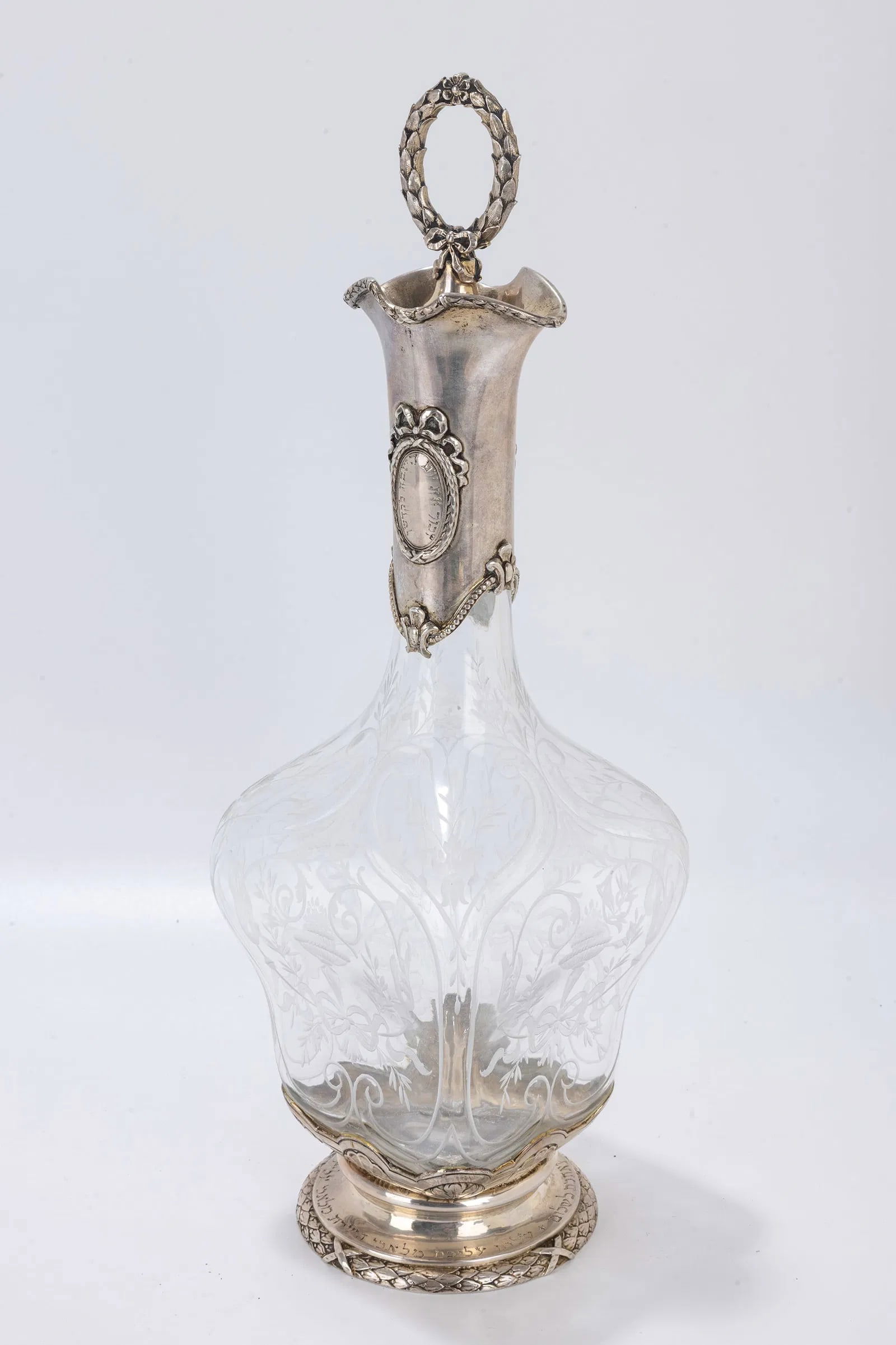 A SILVER AND ETCHED GLASS WINE BOTTLE. Vienna, c. 1880 (1 of 1)