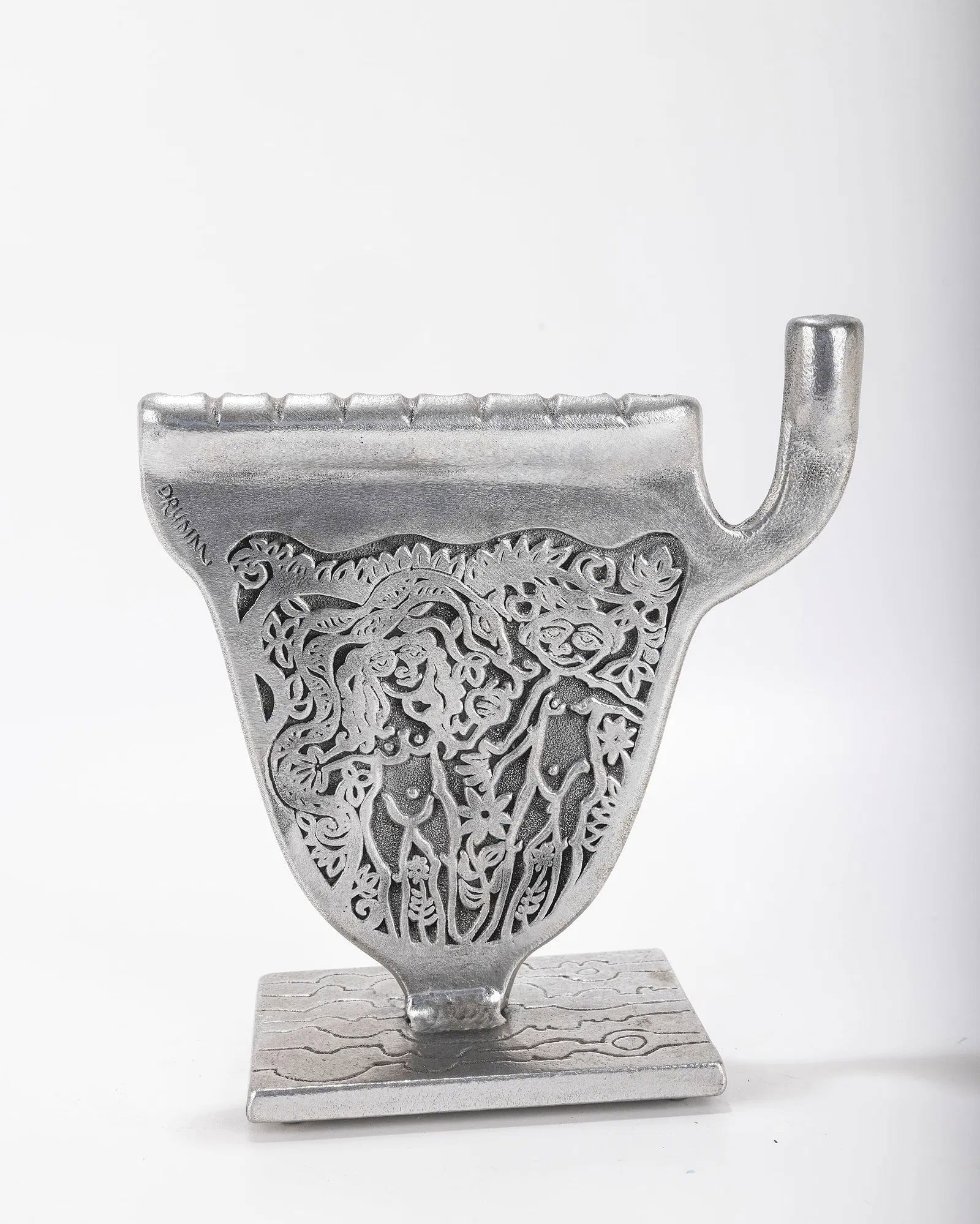 A ALUMINUM MENORAH SCULPTURE BY DON DRUMM (American, b. 1935). (1 of 2)