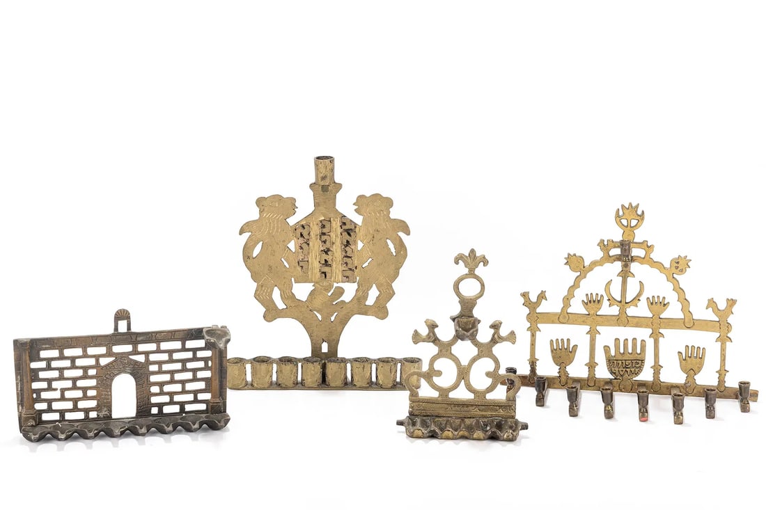 A GROUP OF FOUR BRASS HANUKKAH LAMPS. Probably Israel. (1 of 1)