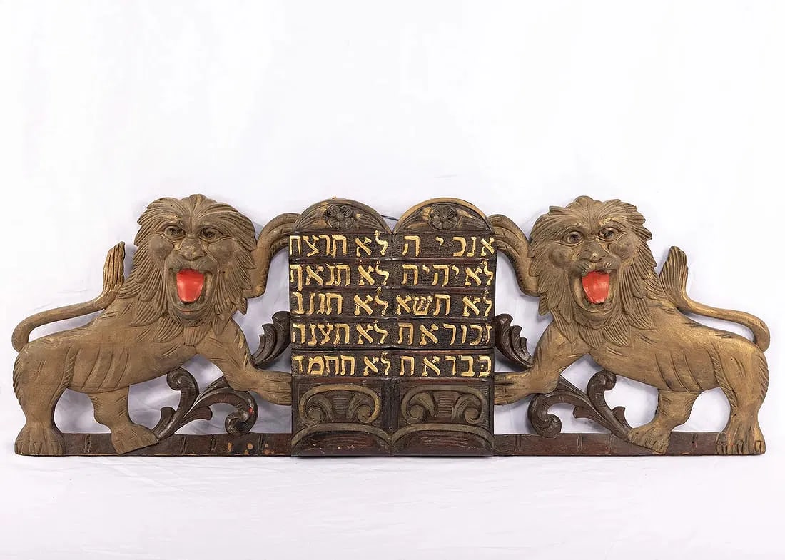 A SET OF SYNAGOGUE LIONS FROM THE TOP OF AN ARON KODESH. American, c. 1920. Two lions flanking a Dec (1 of 1)