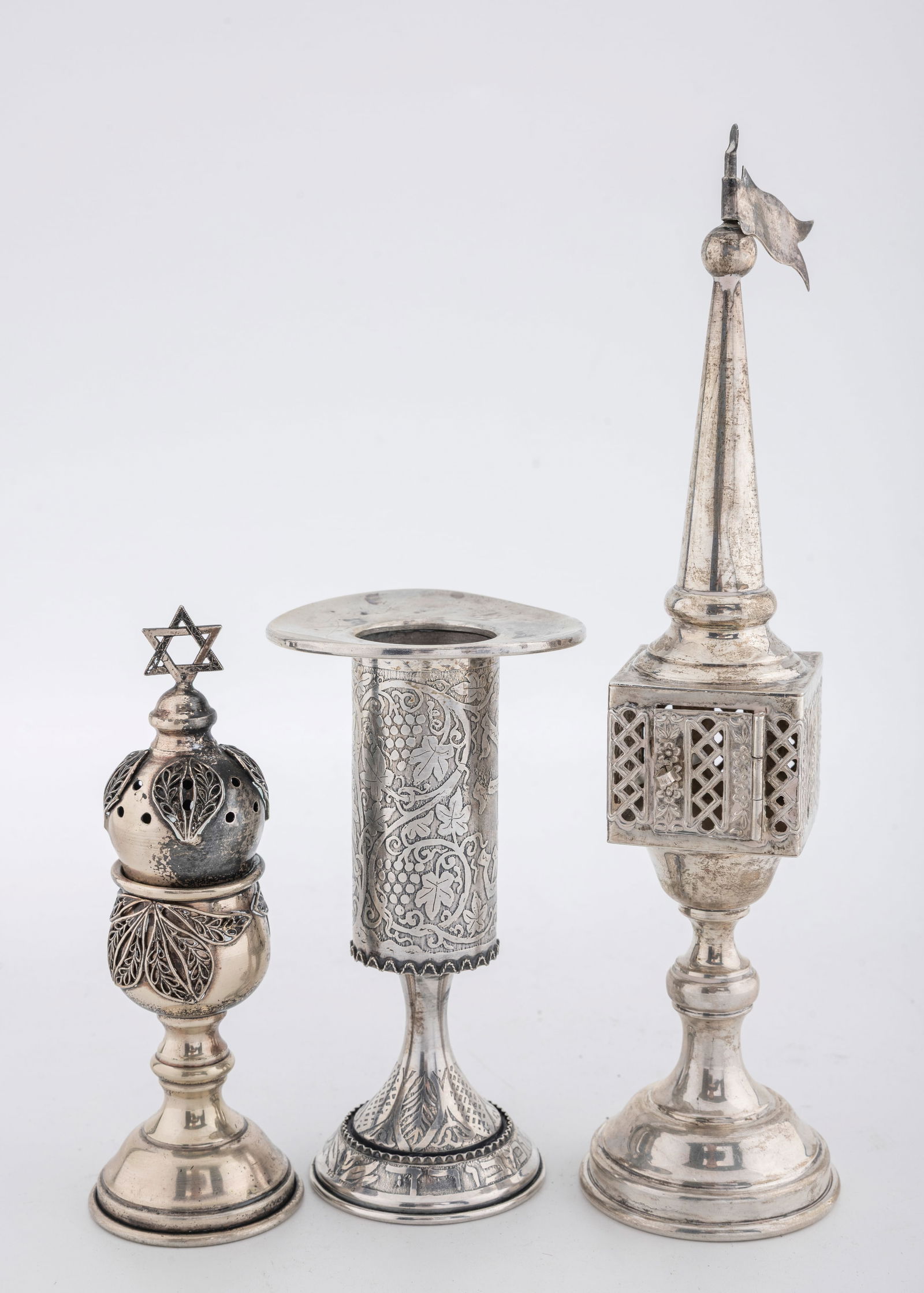 A GROUP OF TWO STERLING SILVER SPICE BOXES AND A CANDLE HOLDER. (1 of 4)