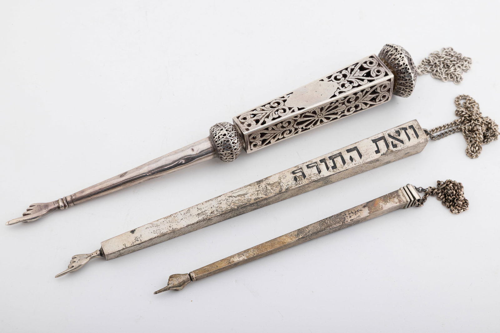 A GROUP OF THREE STERLING SILVER TORAH POINTERS (1 of 1)