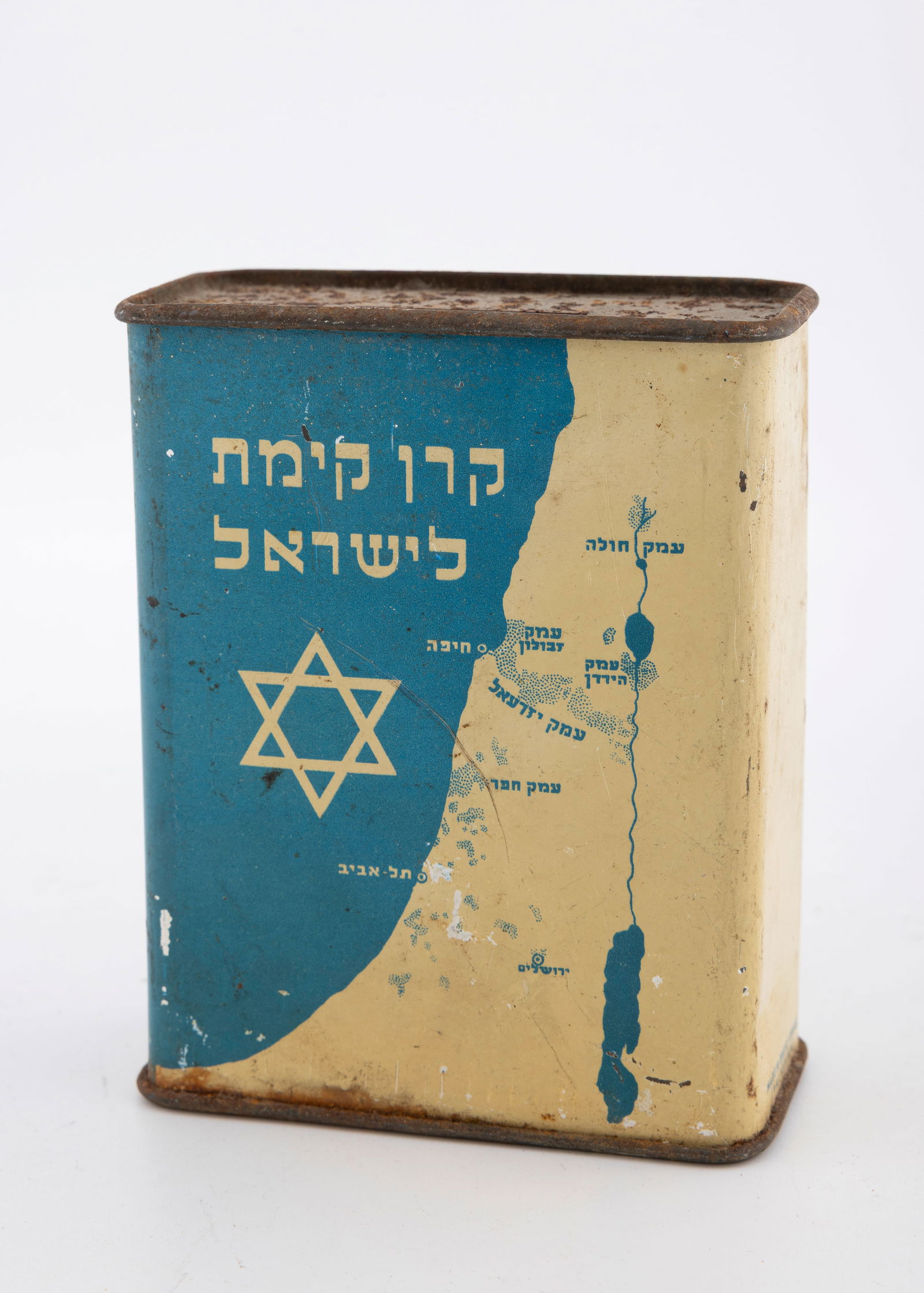 A JEWISH NATIONAL FUND COLLECTION CONTAINER. Palestine, c. 1925.: With the Keren Kayemet LeYisroel name, a Jewish Star and the Holy Land map on the front and the KKL insignia in Hebrew on the verso. 4.6” tall.