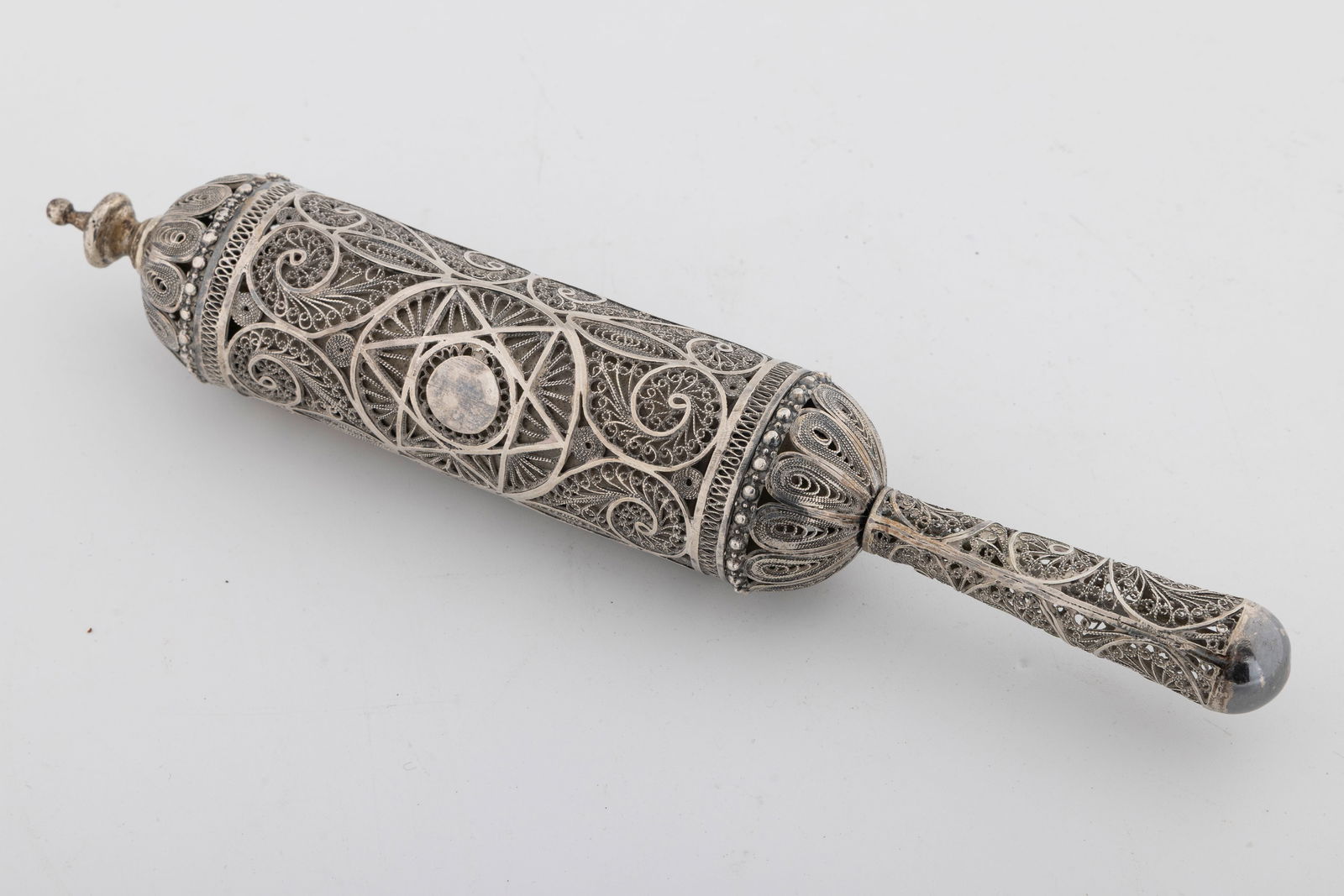 A SILVER MEGILLAH CASE WITH THE ORIGINAL MEGILLAH. Jerusalem, c. 1940 (1 of 3)