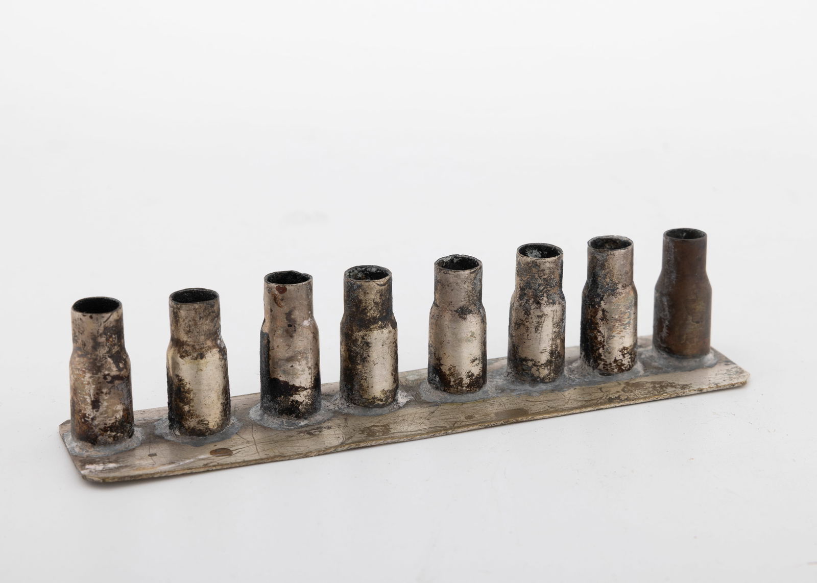 A TRENCH ART HANUKKAH LAMP. Palestine, c. 1920 (1 of 1)