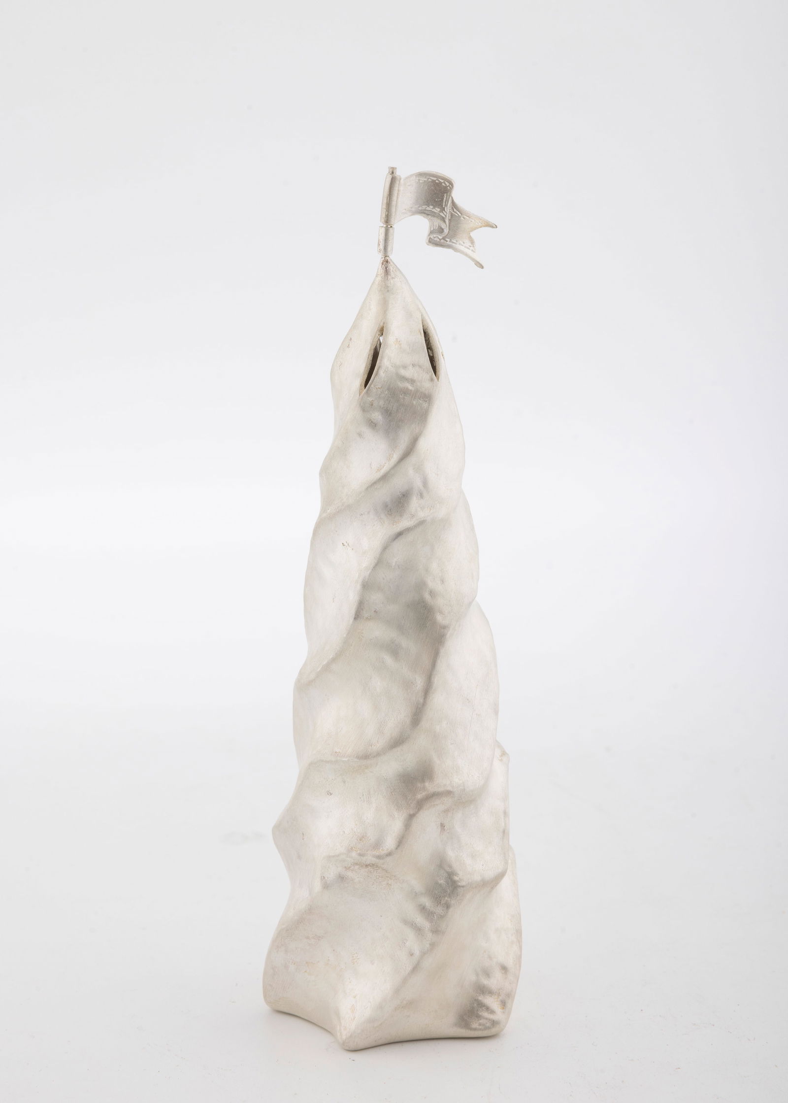 A STERLING SILVER SPICE CONTAINER BY PAMPALONI SILVERSMITHS. Firenze, modern.,: In the form of a candel. With wave design from the "ashur" series. 6.5" tall and 143 grams.