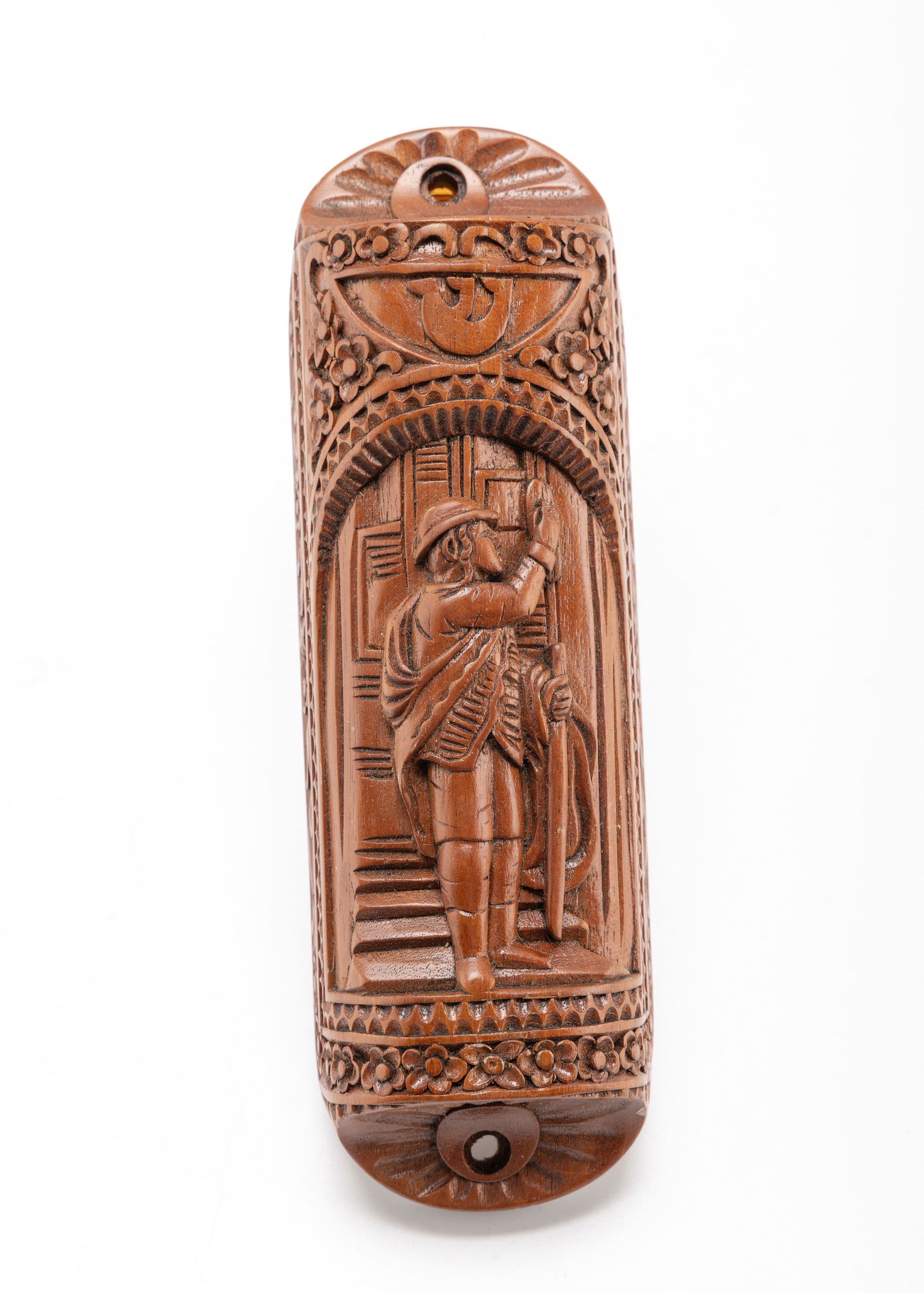 A HAND CARVED WOODEN MEZUZAH. Probably American, modern. Hand carved with a scene of a young man aff (1 of 1)