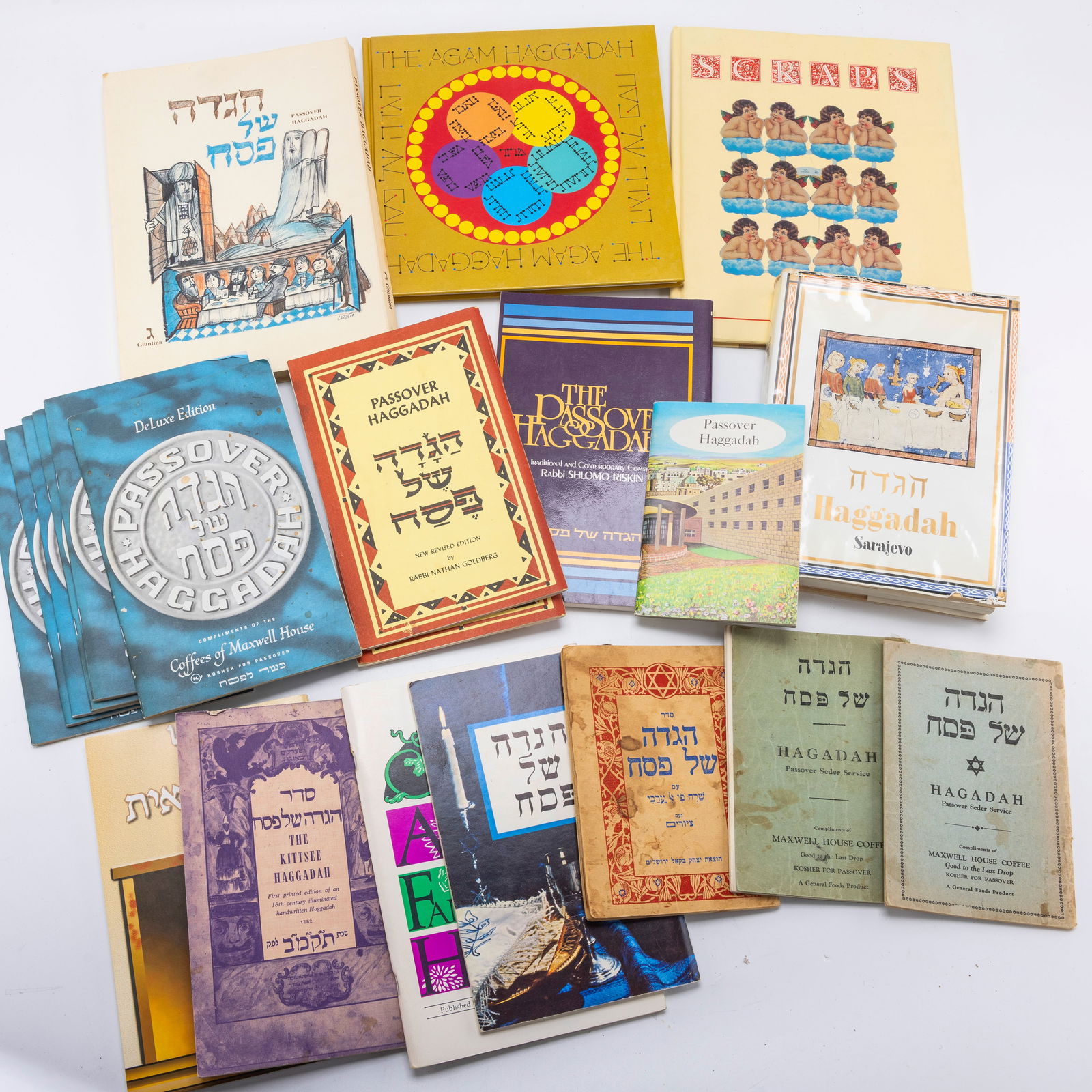 A COLLECTION OF 21 VARIOUS HISTORICAL HAGGADOT. (1 of 1)