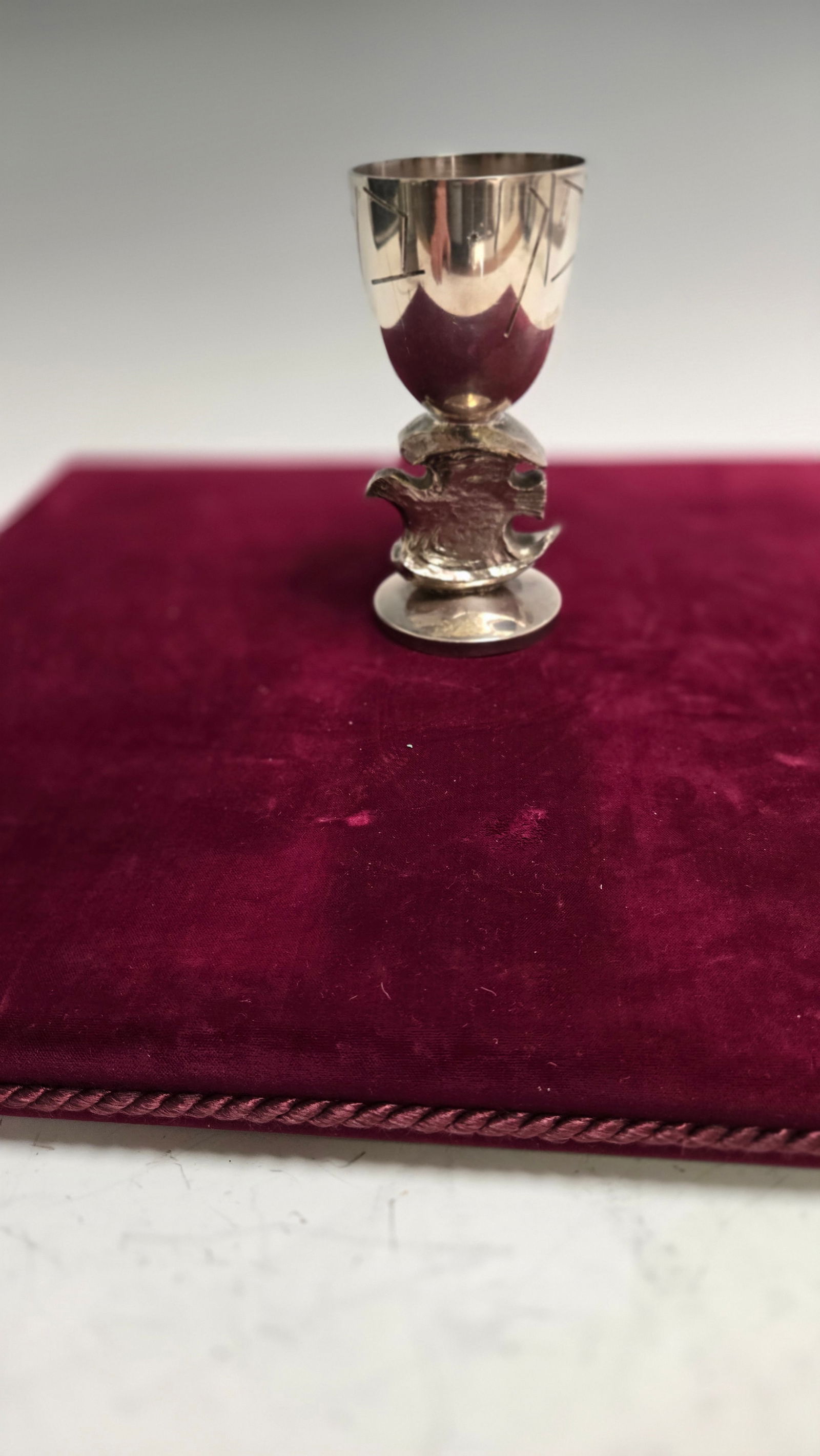 A HEAVY STERLING SILVER KIDDUSH CUP BY GEORGES WEIL NUMBER 1: London, 1980. Dove of Peace cup. Number 1. Georges Weil was sculpture and artist. His clients included Frank Sinatra, Sammy David Jr., Peter Sellers, Queen Elizabeth of England, and Elizbeth Taylor. 1