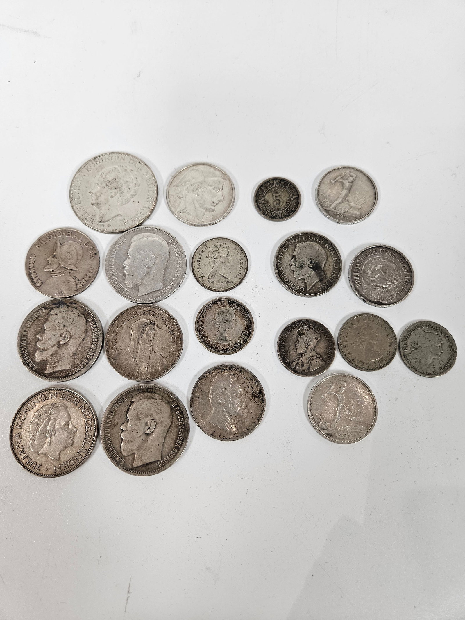 A GROUP OF WORLD SILVER COINS (1 of 6)