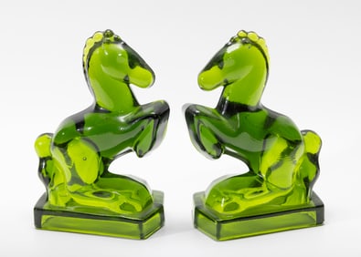 A PAIR OF EMERALD GREEN REARING HORSE BOOKENDS