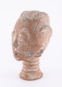 AN EARLY TERRCOTTA SCULPTED HEAD.