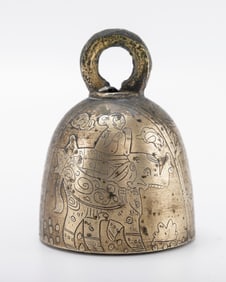 A LARGE ACID ETCHED BRASS COW BELL. India, early 20th century.