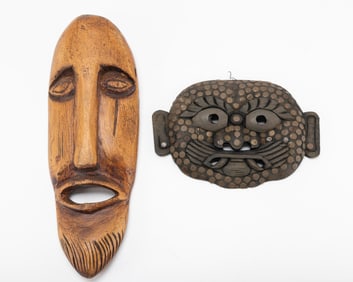 TWO HAND CARVED AFRICAN MASKS