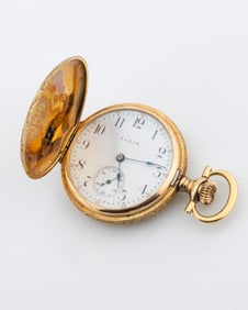 A 14k GOLD POCKETWATCH BY ELGIN AND COMPANY.