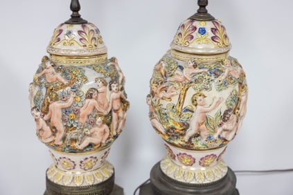 TWO CAPODIMONTE URNS CONVERTED TO LAMPS.