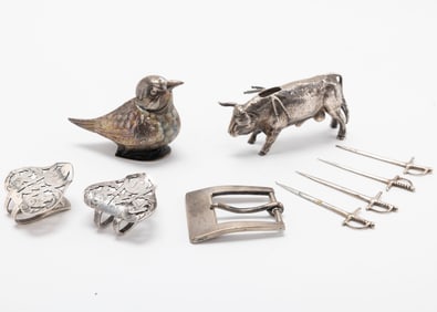 A SILVER TIFFANY BELT BUCKLE A BULL SWORD HOLDER AND A SILVER BIRD BOX