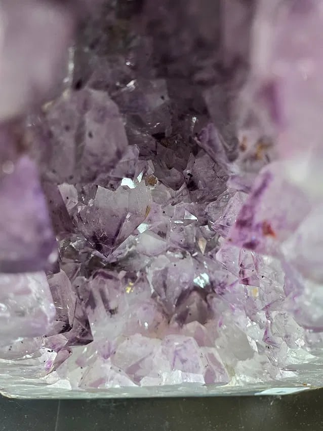 AN AMETHYST GEODE. POLISHED EDGES - 2