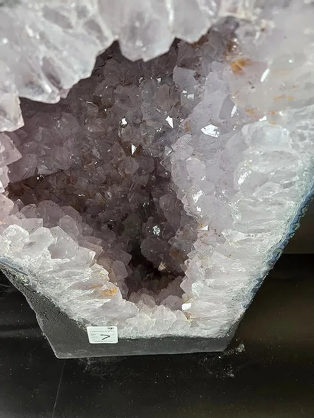 AN AMETHYST GEODE. POLISHED EDGES - 2