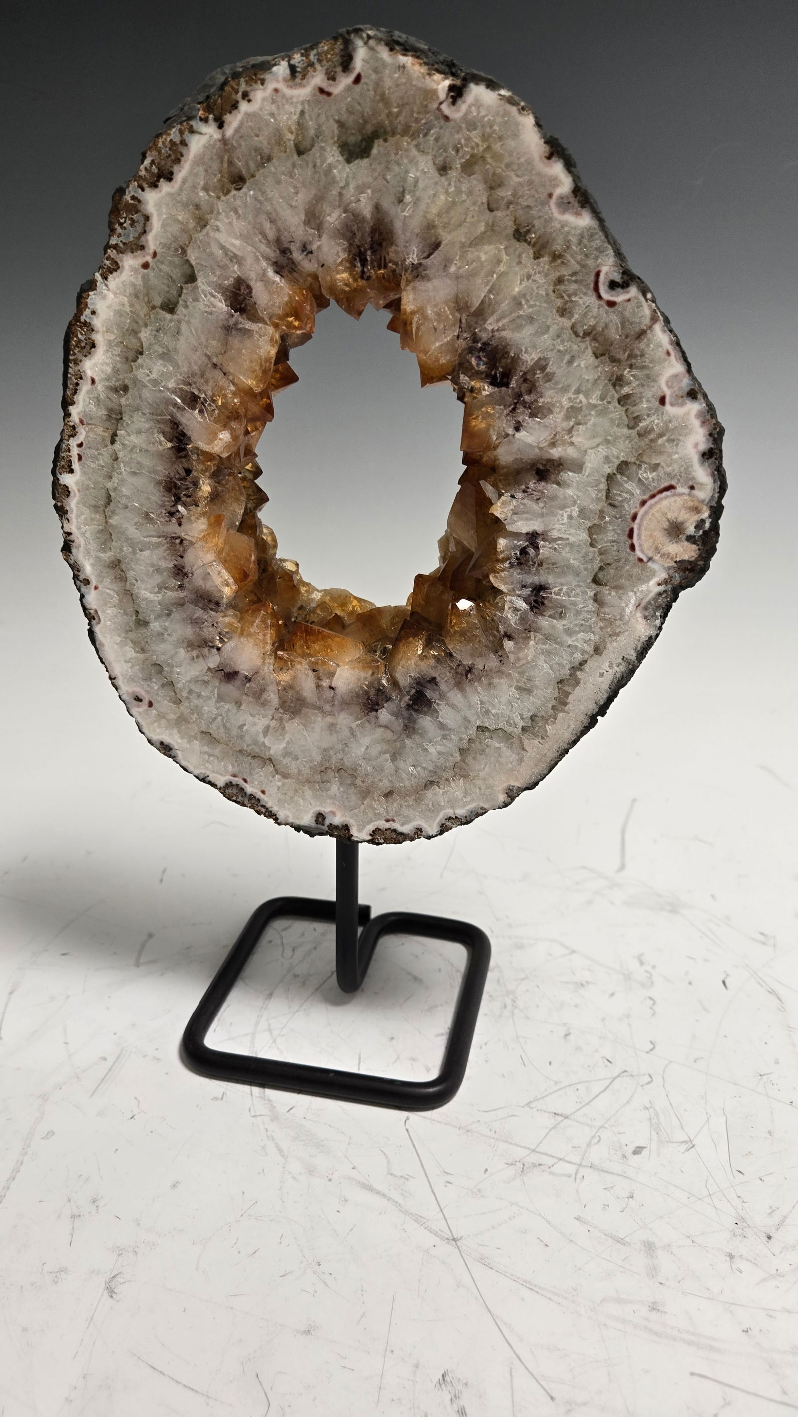 A CITRINE RING ON A DISPLAY STAND MAGNIFICENT CRYSTALS (1 of 2)