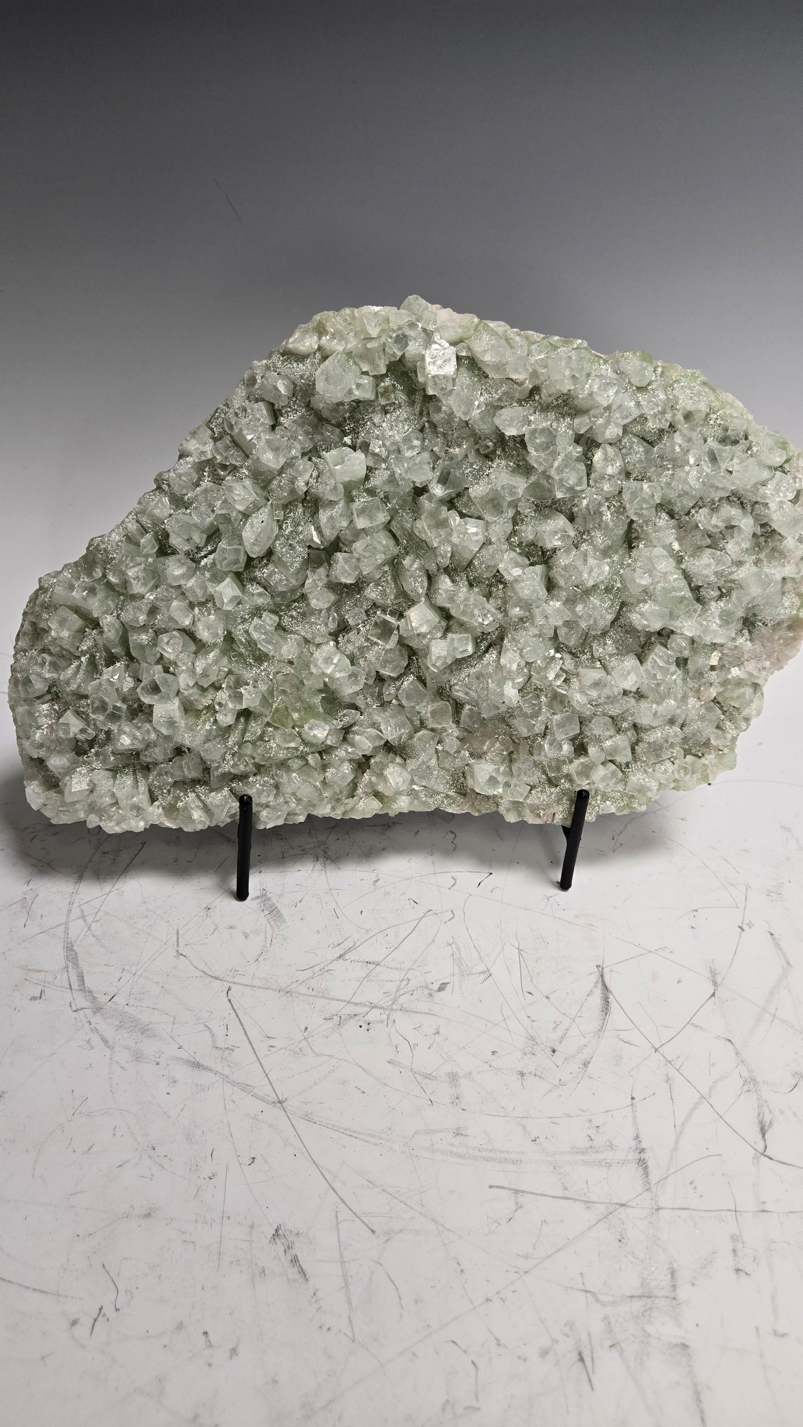 AN APOPHYLITE SPECIMEN INDIA: Green in color. 11" long.