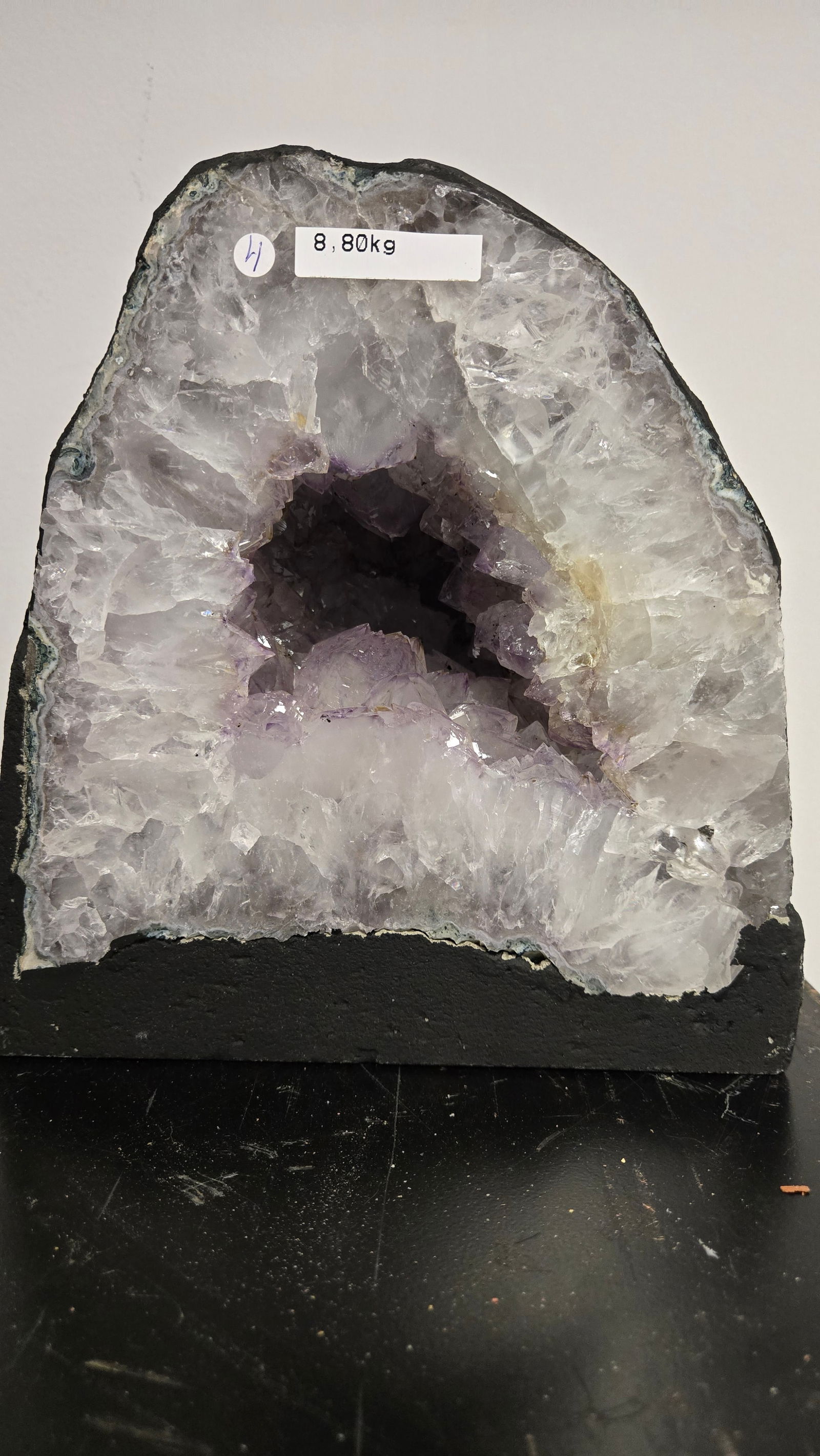 AMETHYST GEODE WITH POLISHED EDGES CATHEDRAL: Lighte purple in color. Polished edge. Triangular in shape. 8.2" tall and 8.8 kilograms