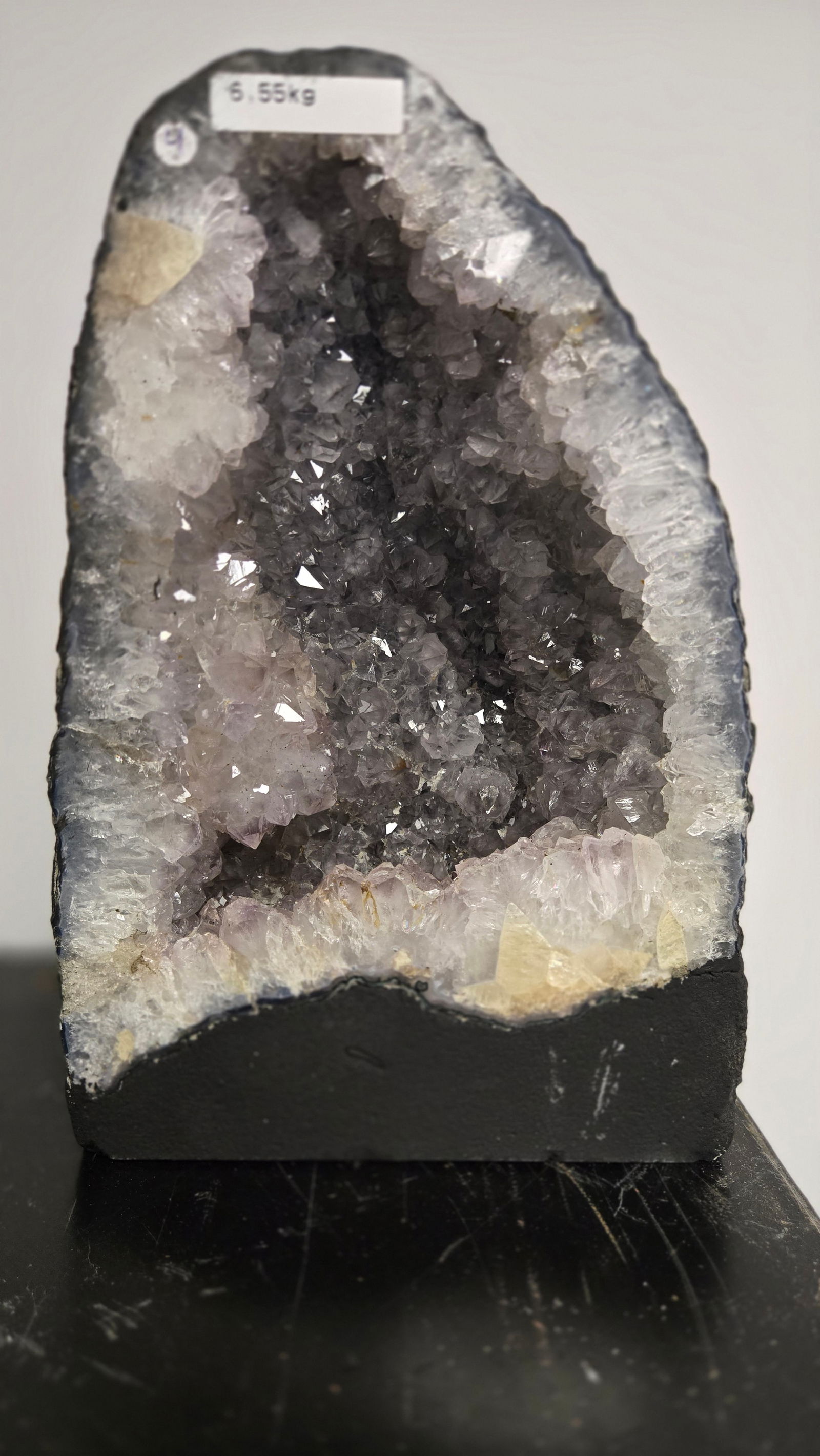 AMETHYST GEODE WITH POLISHED EDGES CATHEDRAL: Light purple in color. Polished edge. Triangular in shape. 10" tall and 6.55 kilograms