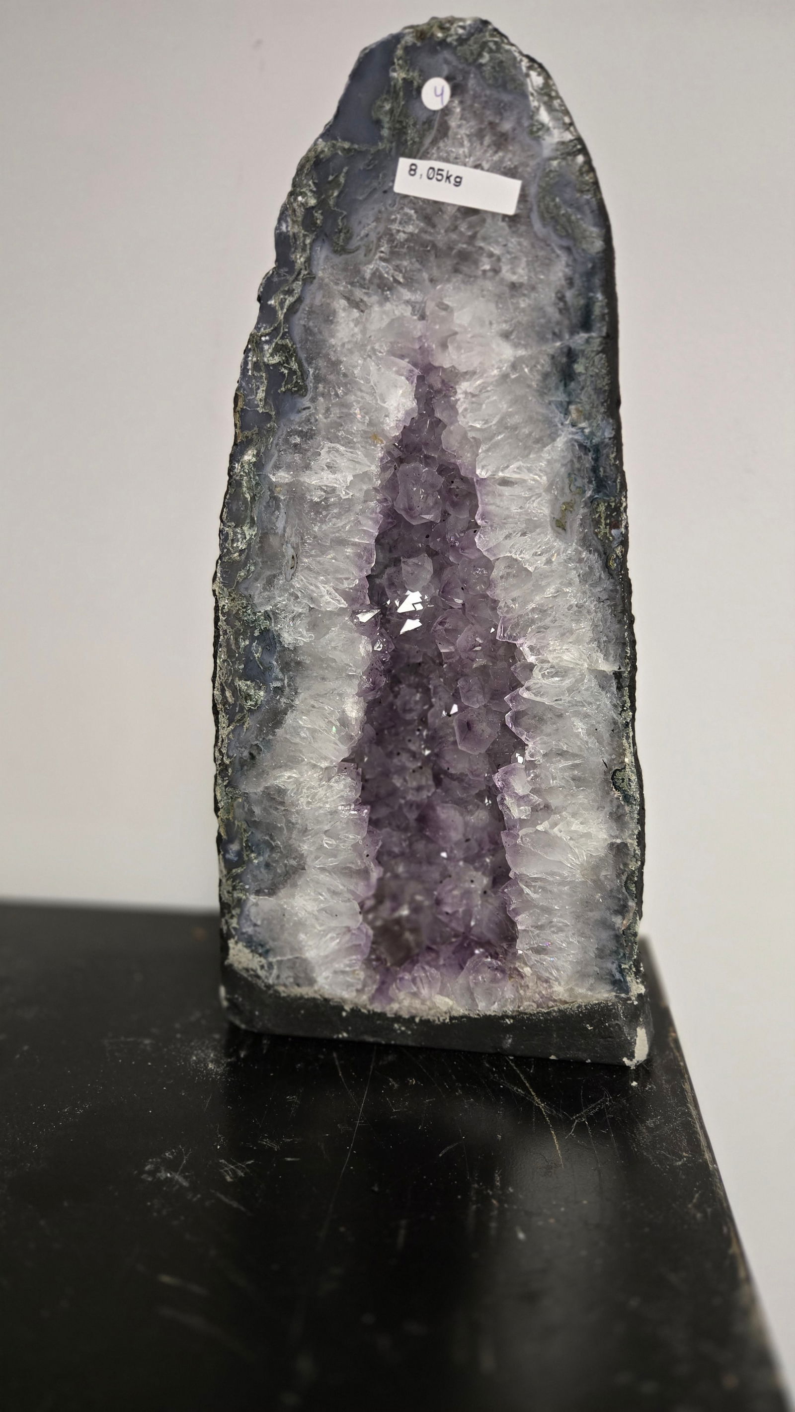 AMETHYST GEODE WITH POLISHED EDGES CATHEDRAL: Light purple in color. Polished edge. Triangular in shape. 14" tall and 8.5 kilograms