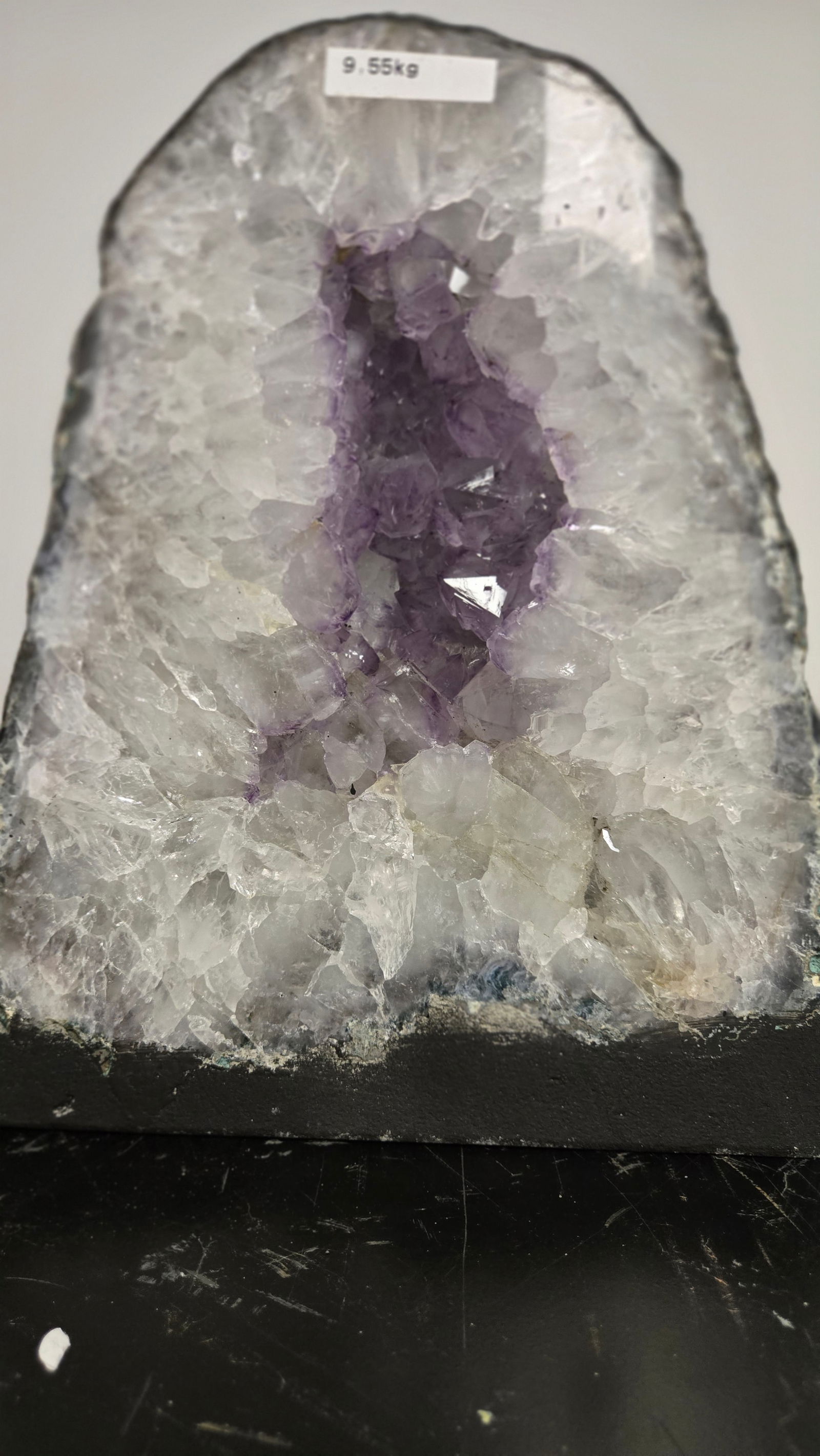 AMETHYST GEODE WITH POLISHED EDGES CATHEDRAL: Light purple in color. Polished edge. Triangular in shape. 11" tall and 9.5 kilograms