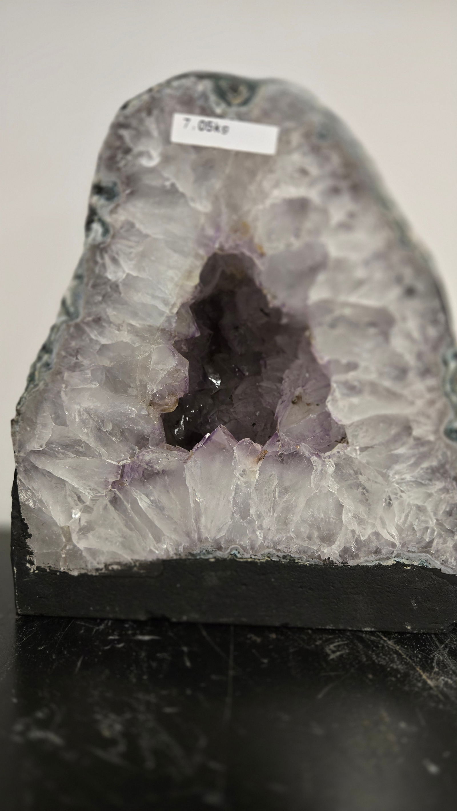 AMETHYST GEODE WITH POLISHED EDGES CATHEDRAL: Light purple in color. Polished edge. Triangular in shape. 8.5" tall and 7.5 kilograms.