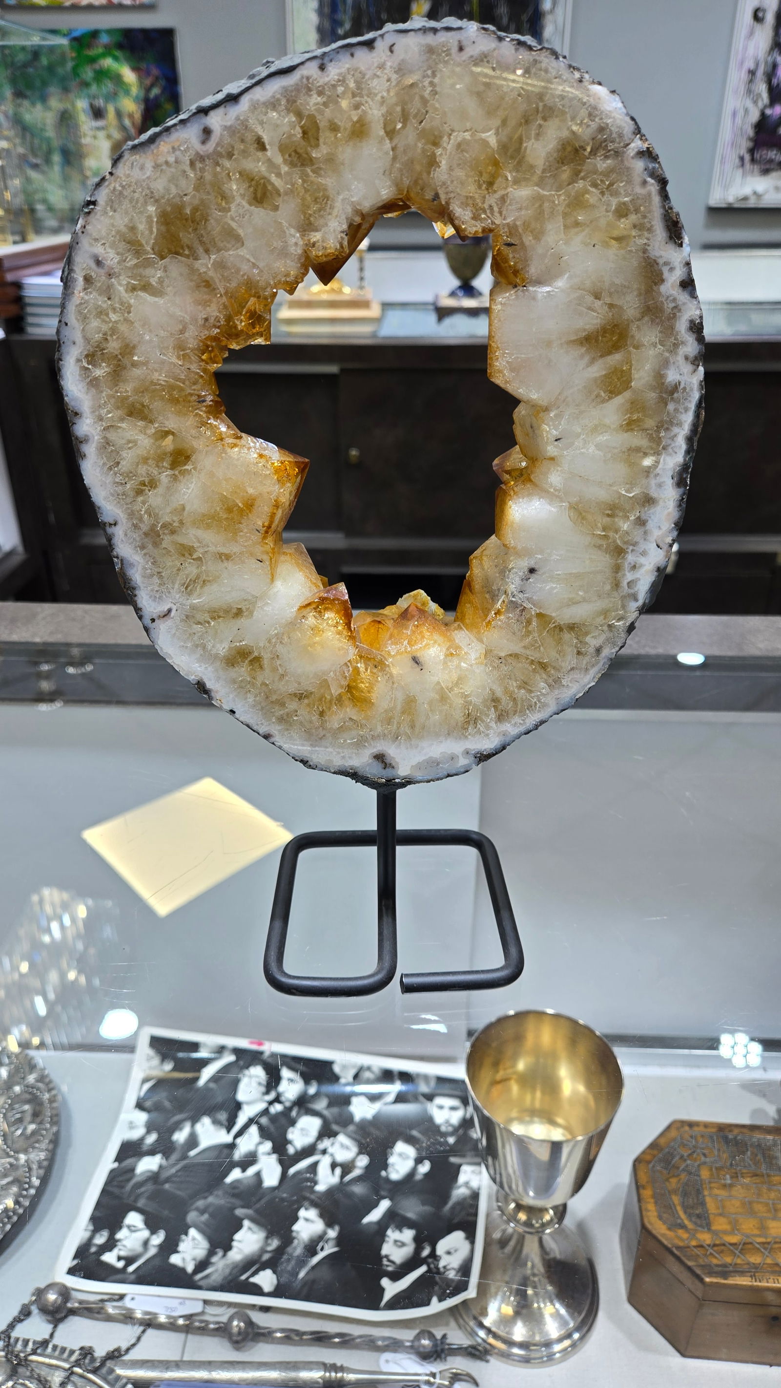 CITRINE RING ON A STAND: Excellent color. stylized ring shape.