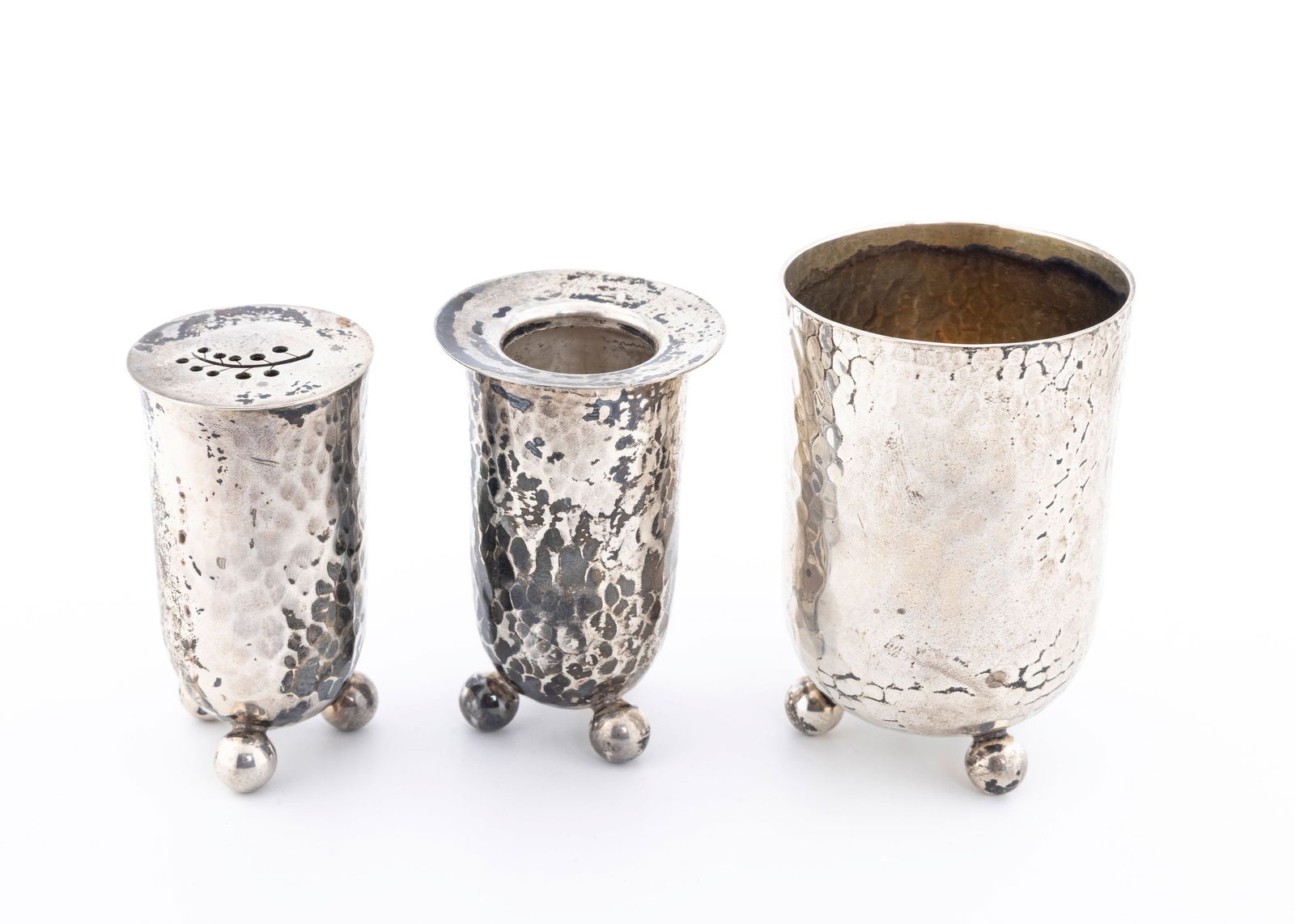 A STERLING SILVER HAVDALLAH SET BY BIER MASTER SILVERSMITHS: Israel, c. 1980. Hand wrought. Hand hammered in modernist styles. Witha candle holder, a spice cbox and a large cup. The cup is 3.3" tall. Total weight is 269 grams