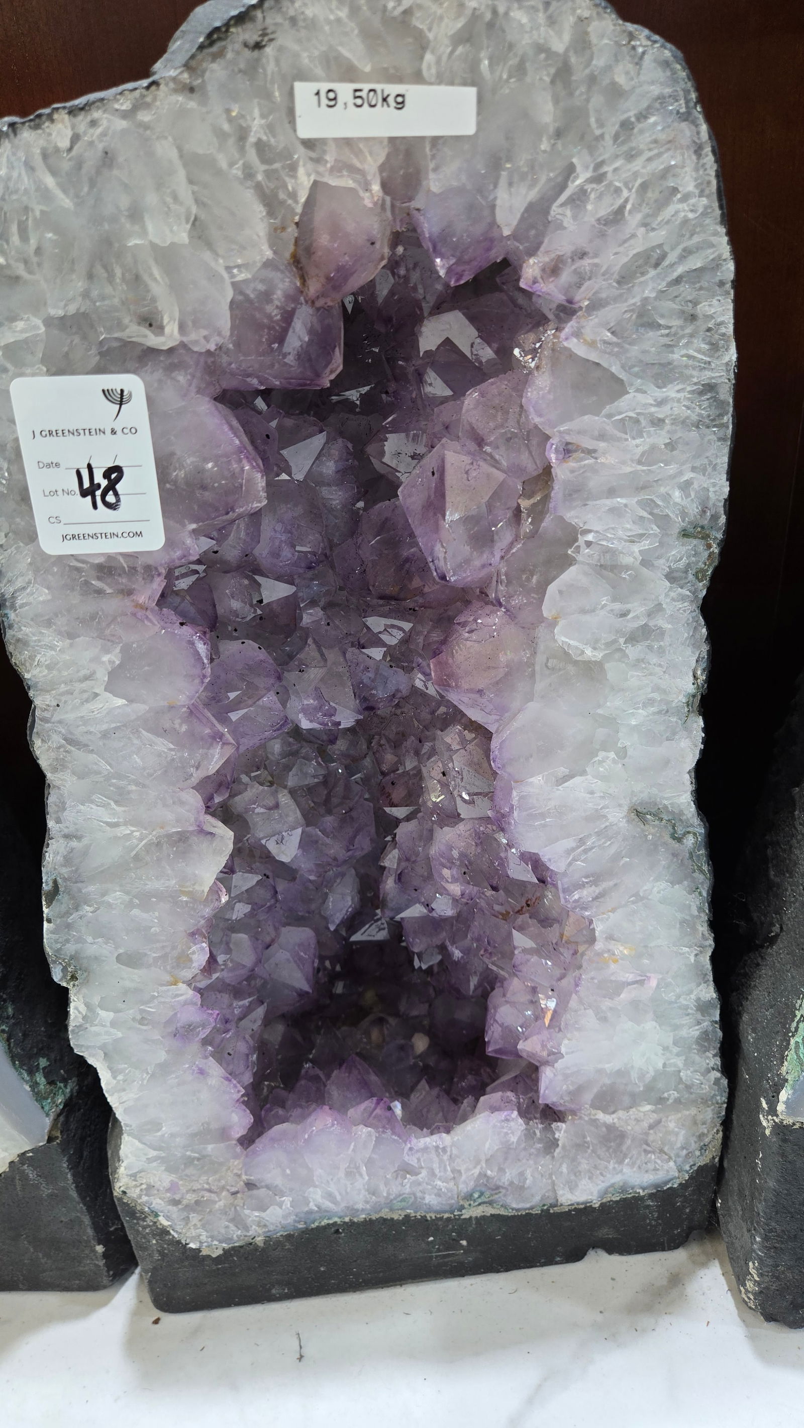 A LARGE AMETHYST CATHEDRAL POLISHED EDGES: Light in color. With a nice soft blue polished rim. 19.5 kilograms and 17.5" tall.