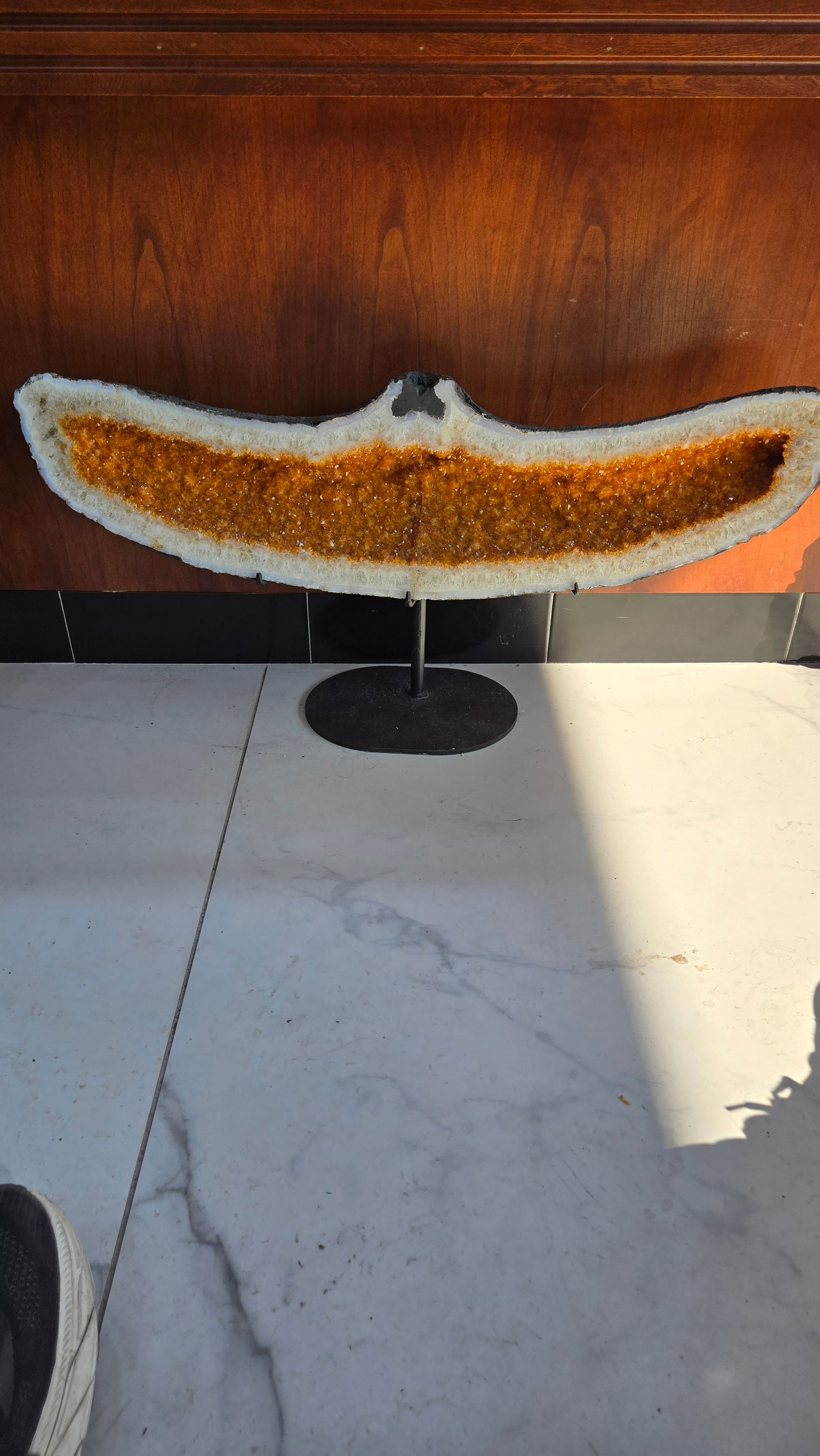 A MASSIVE CITRINE "SMILE" ON A STAND GORGEOUS: A massive cathedral in the shape of a smile. 32" wide