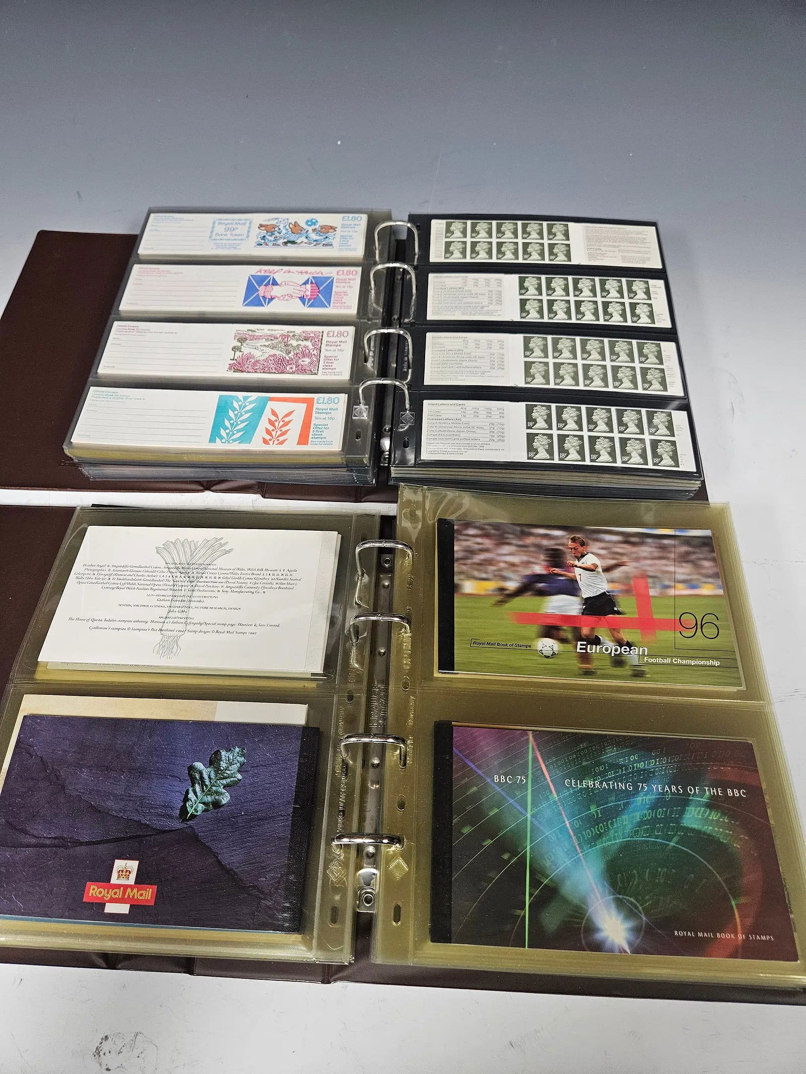 A COLLECTION OF many HUNDREDS OF UNUSED GREAT BRITAIN STAMPS.2 binders, totalling a couple (1 of 18)