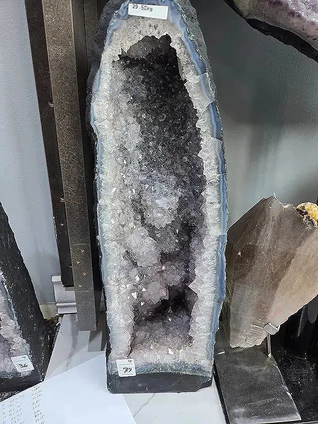 AMETHYST CATHEDRAL GEODE WITH POLISHED EDGES: 26" TALL, 8" AT IT'S WIDEST 29.5 KILOGRAMS