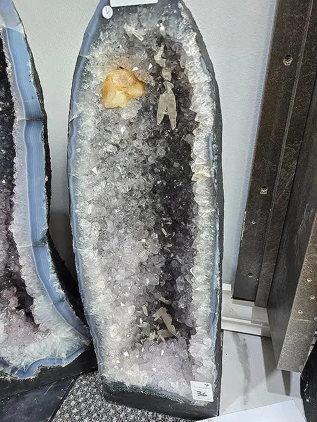 AMETHYST CATHEDRAL GEODE WITH POLISHED EDGES: 24" TALL, 7.5" AT IT'S WIDEST 23.6 KILOGRAMS
