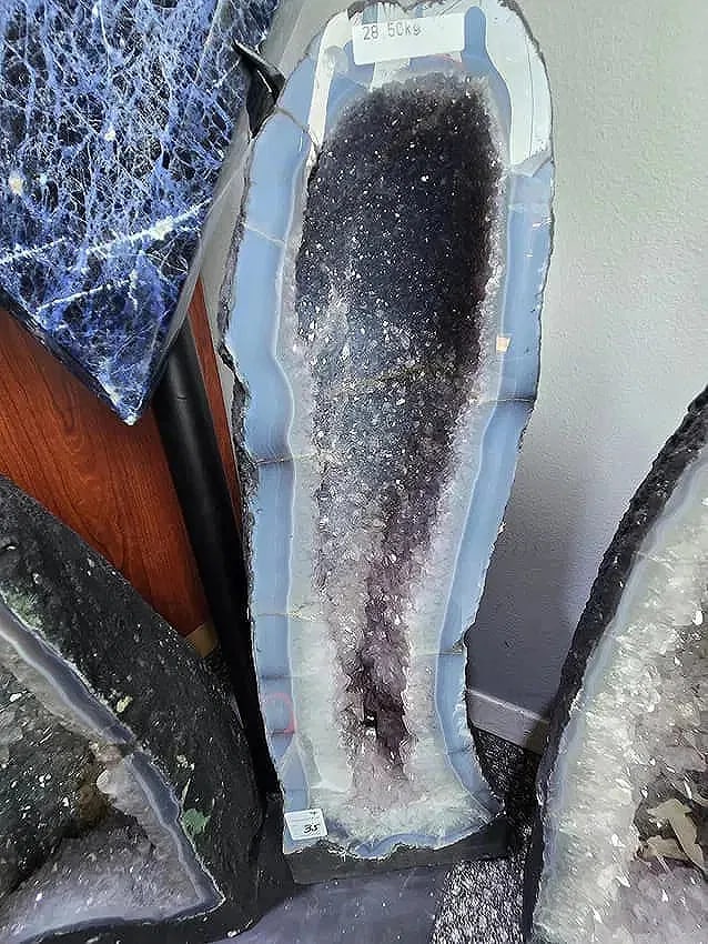 AMETHYST CATHEDRAL GEODE WITH POLISHED EDGES: 25" TALL, 9" AT IT'S WIDEST 28.5 KILOGRAMS