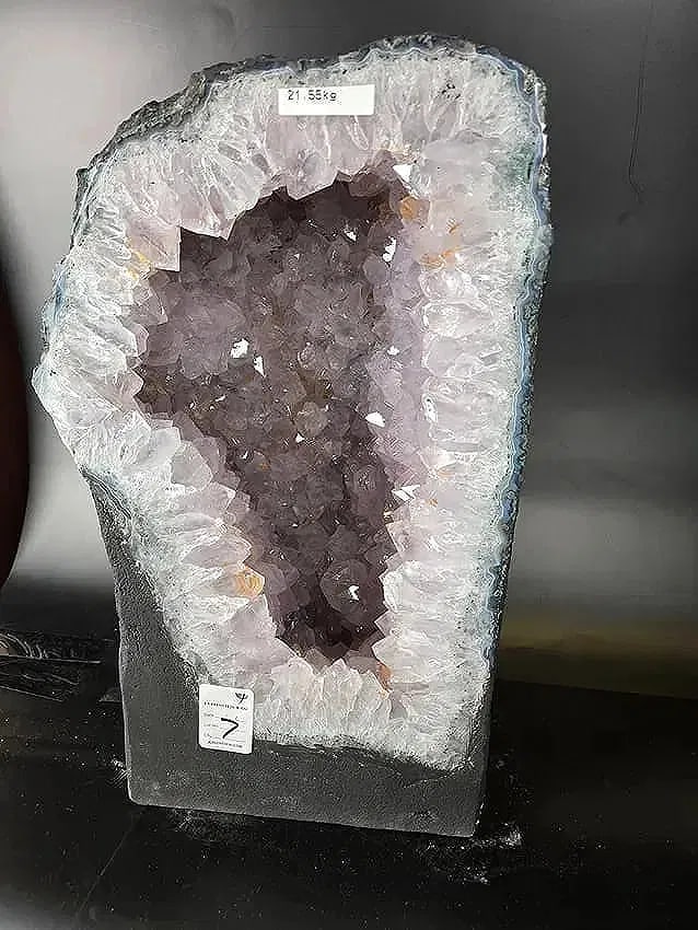 AMETHYST CATHEDRAL GEODE WITH POLISHED EDGES: 9.7" wide and 16" tall. This magnificent cathedral weights 21.55 kilograms