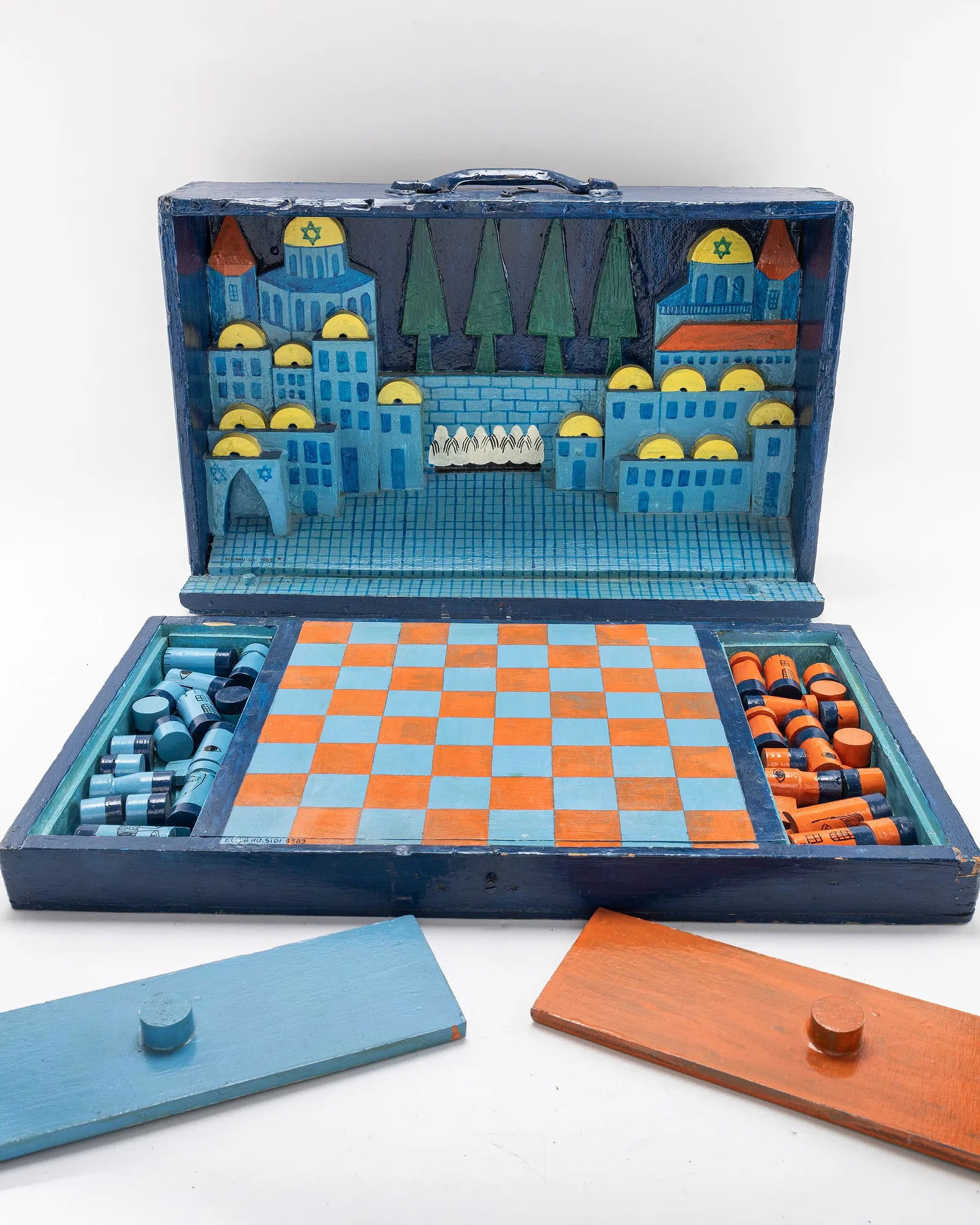 ELIYAHU SIDI - CHESSBOARD, CITY OF JERUSALEM: Bernard Eliyahu Sidi (B. 1936, France). 20" wide. Complete hand made chess set.