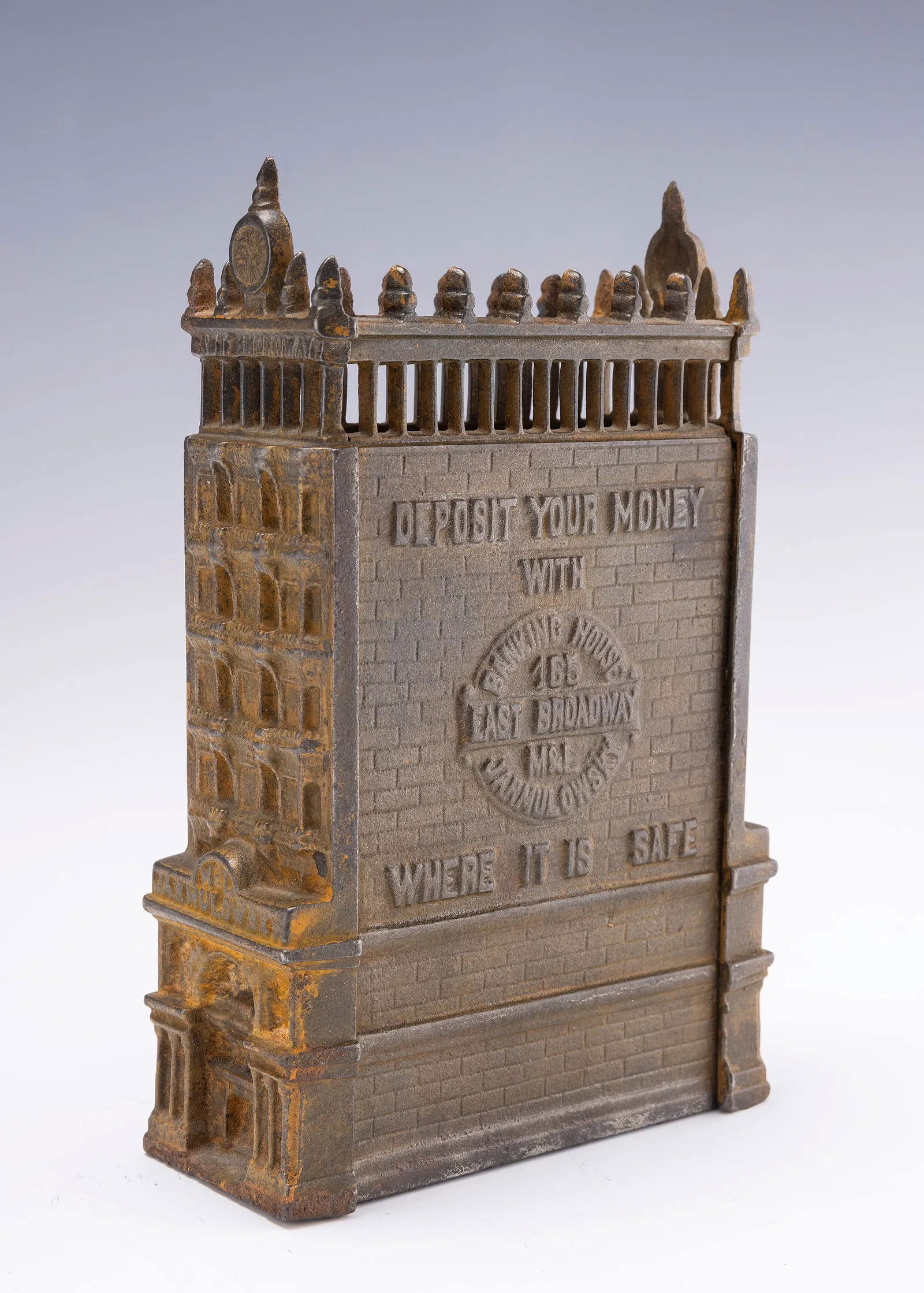 A CAST IRON SAVINGS BANK OF THE JARMULOWSKY BUILDING. New York, early 20th century. (1 of 4)