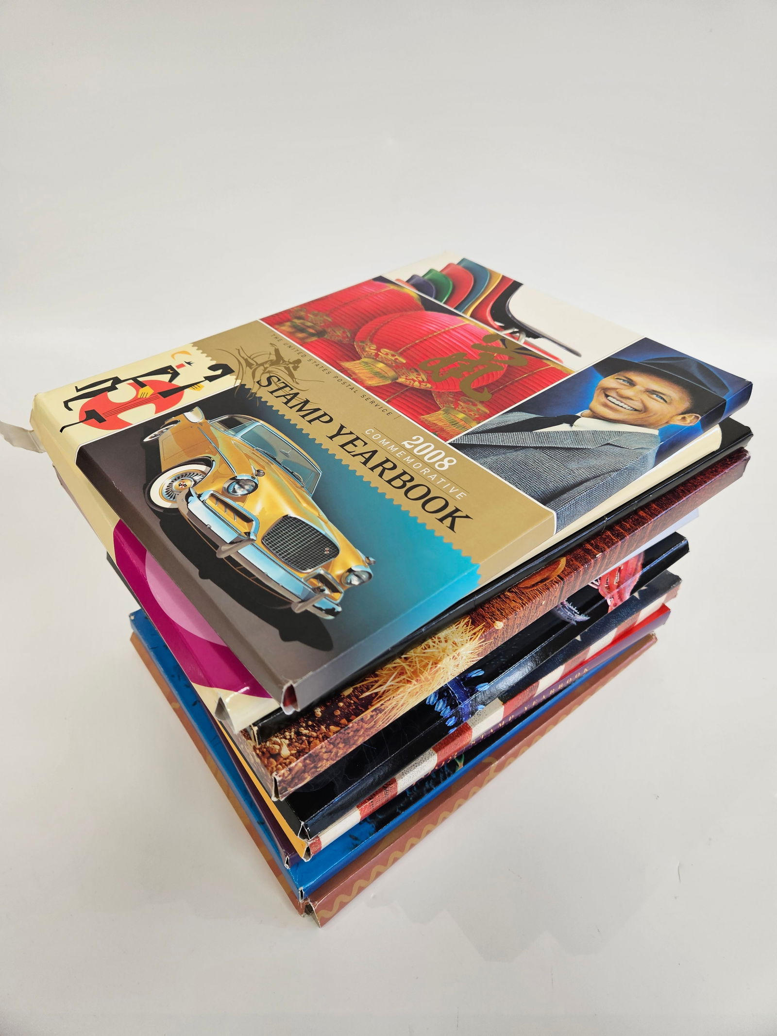 A LARGE COLLECTION OF UNITED STATES STAMP YEARBOOKS (1 of 4)