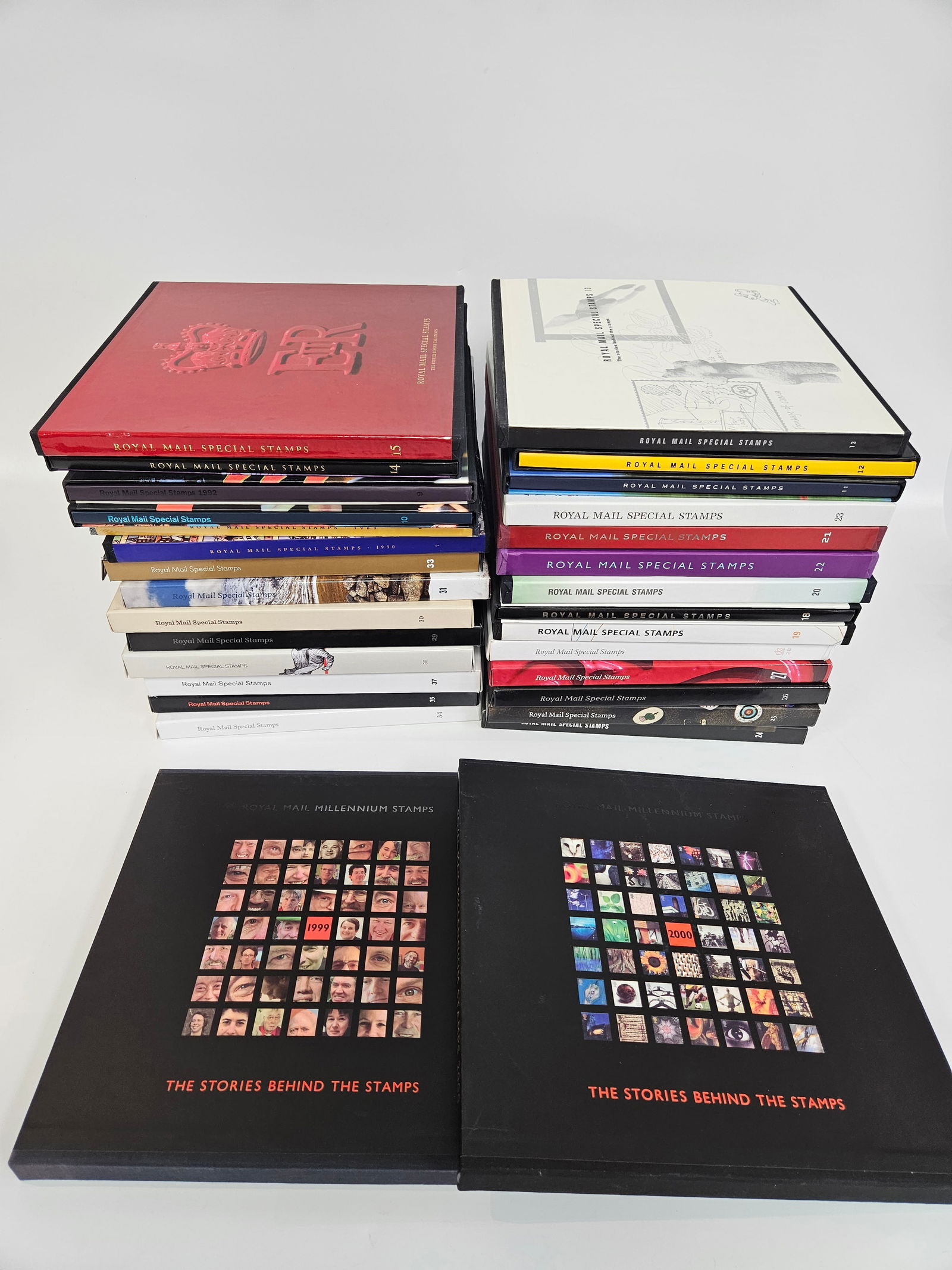 A MASSIVE COLLECTION OF ROYAL MAIL POSTAL YEARBOOKS: Approximately 25 years of United Kingdom Royal mail yearbooks. From the late 20th and early 21st centuries.